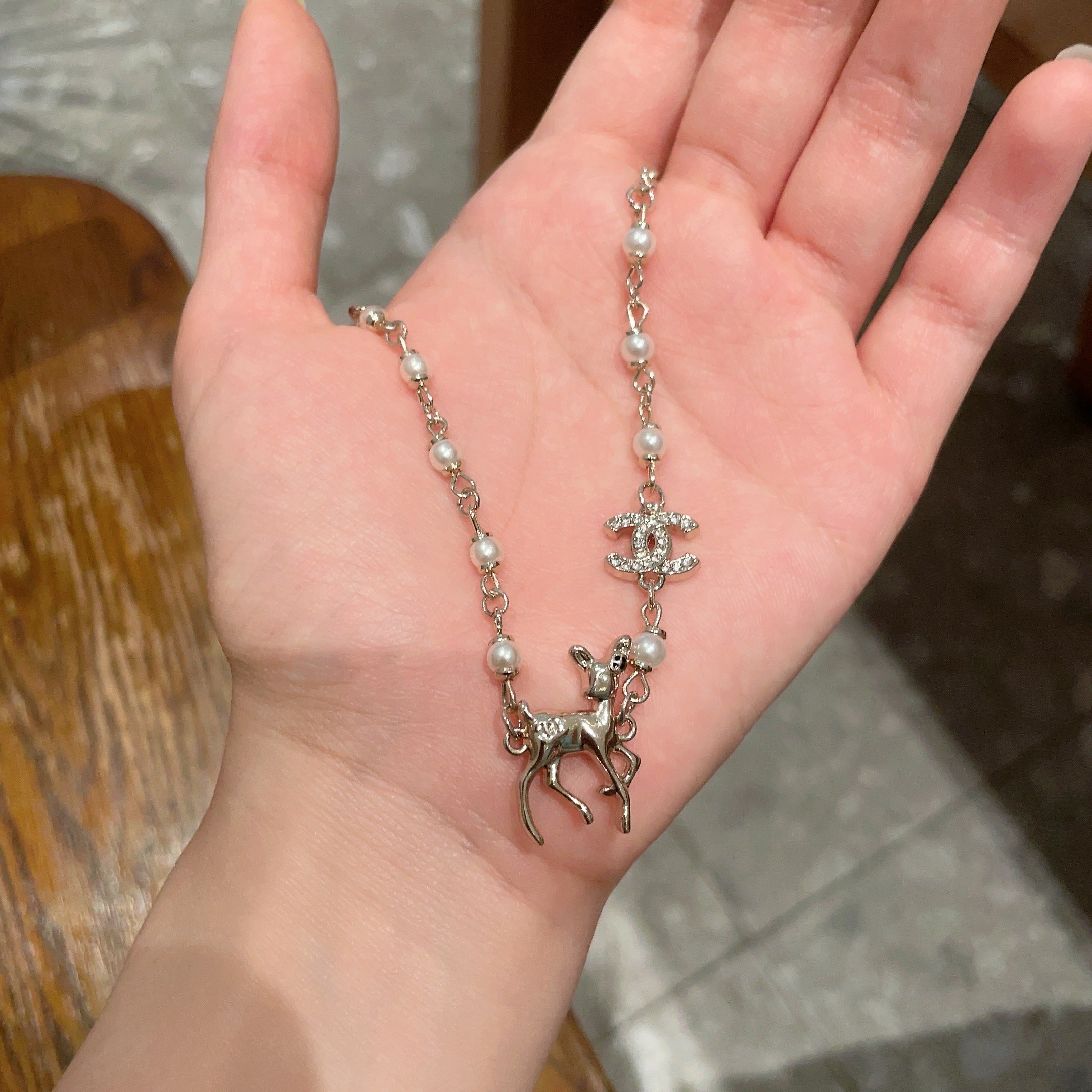 Chanel CC Logo Deer Charm Pearl Choker necklace light gold metal white faux pearl clear crystal 40cm