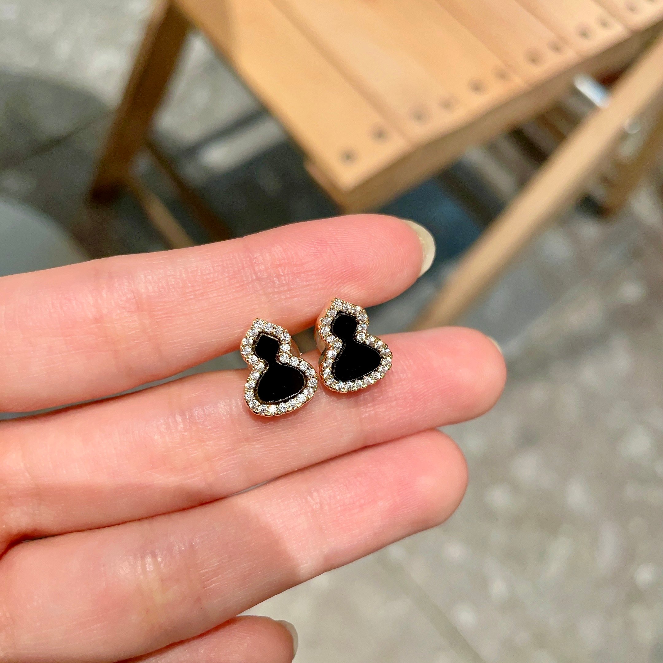 Qeelin Kirin Mini Gourd earrings 18K rose gold with black onyx inlay and diamond pave accents mini stud size