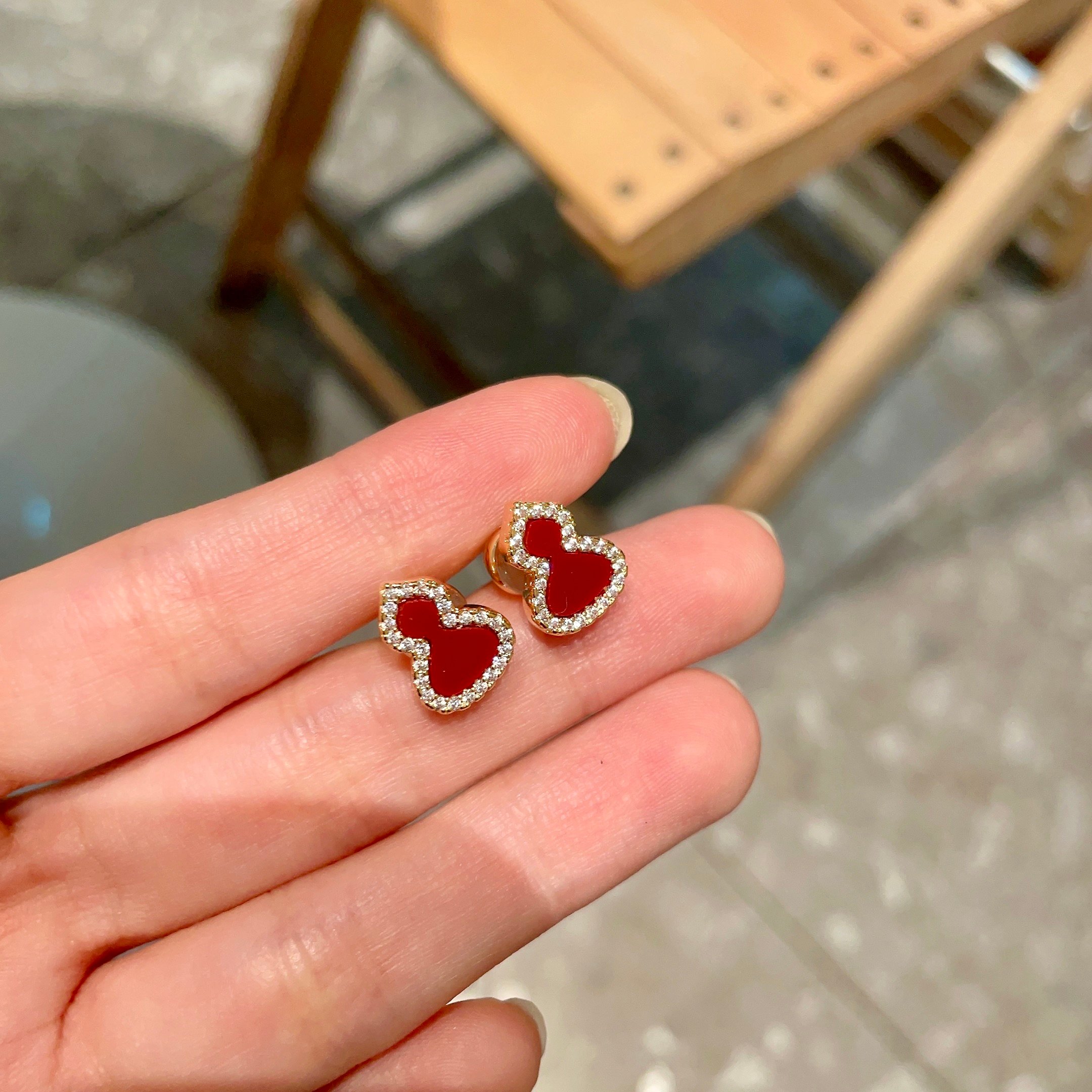 Qeelin Wulu earrings 18k rose gold with diamonds available in mother-of-pearl red agate and open diamond versions mini