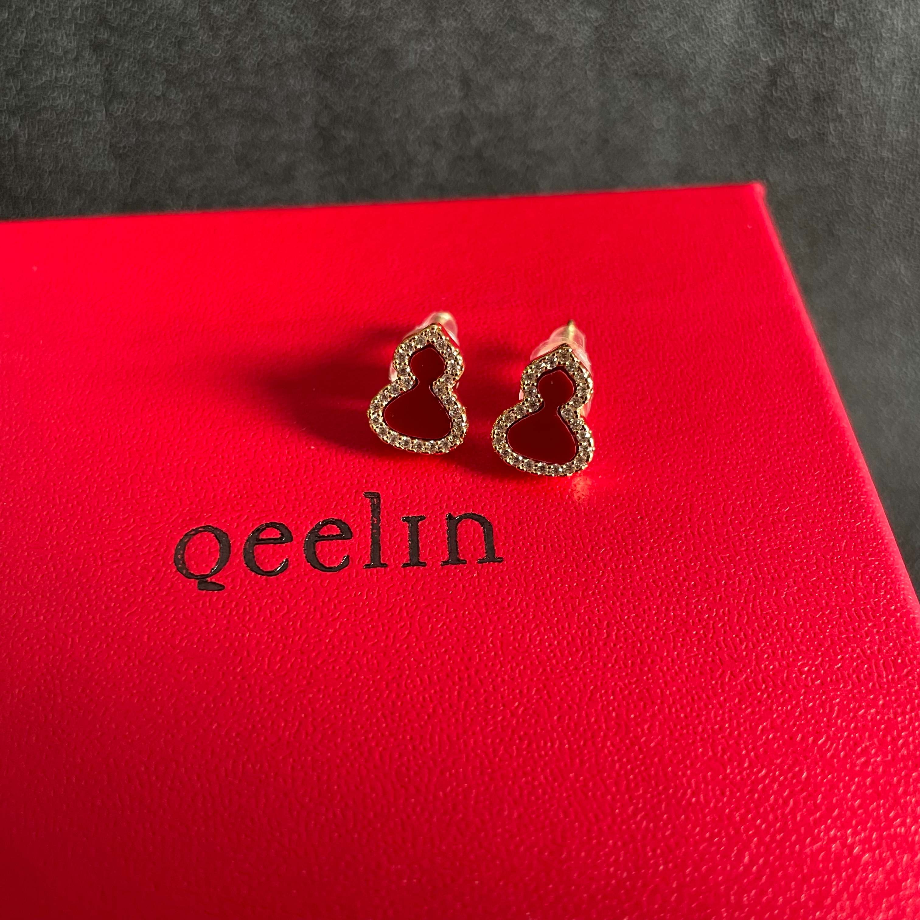 Qeelin Wulu earrings 18k rose gold with diamonds available in mother-of-pearl red agate and open diamond versions mini