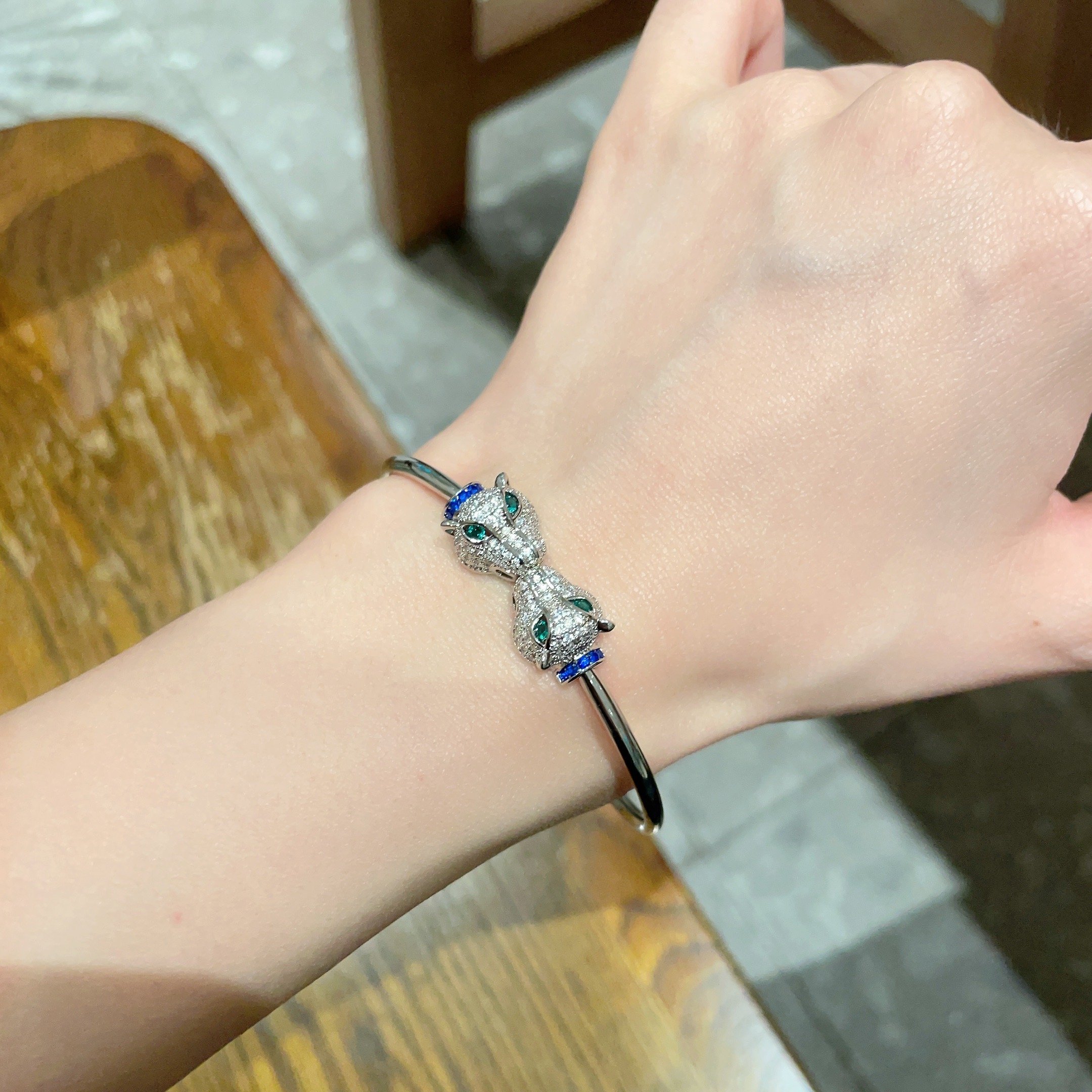 Cartier Panthere de Cartier bracelet 18k white gold diamond emerald sapphire 17