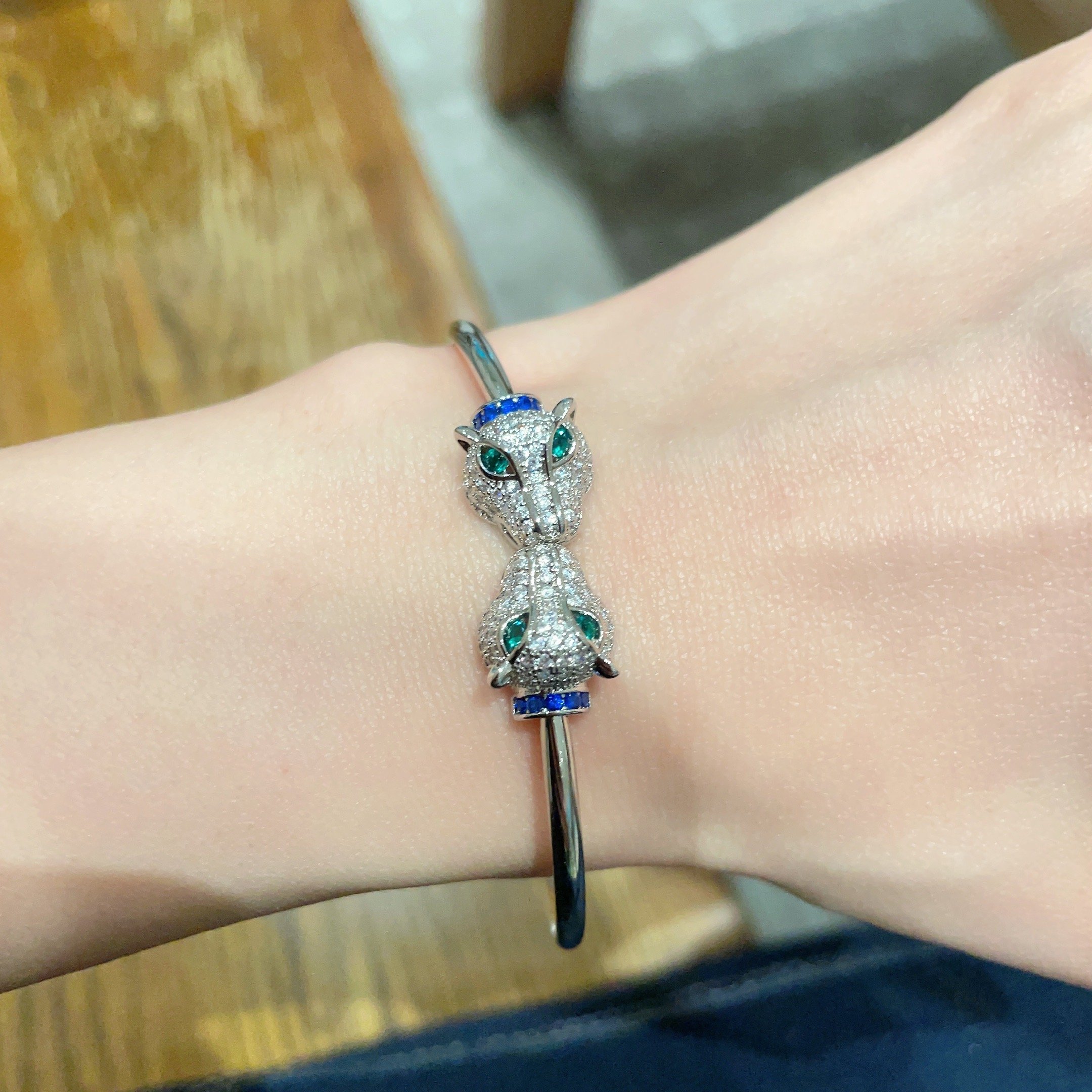 Cartier Panthere de Cartier bracelet 18k white gold diamond emerald sapphire 17