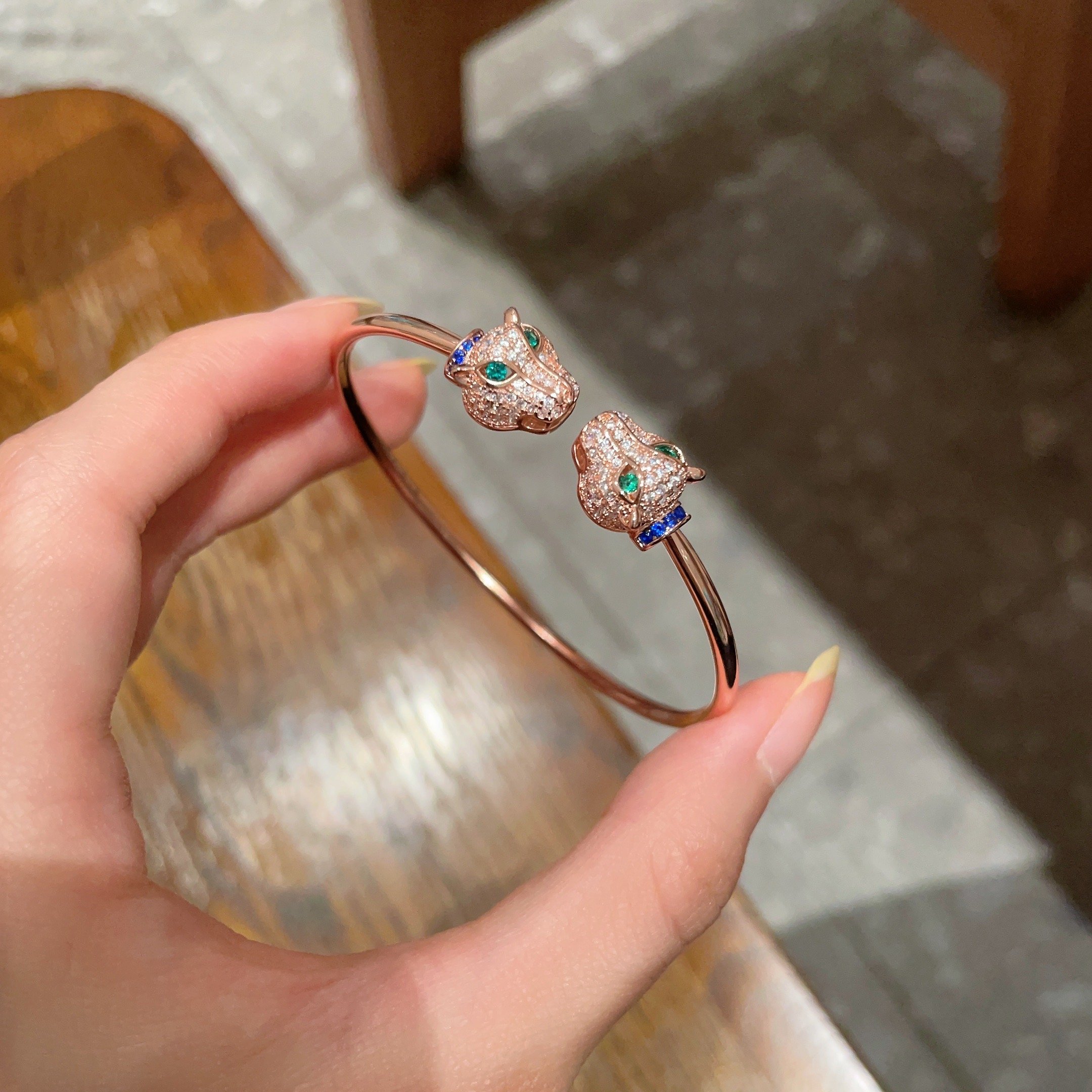 Cartier Panthere de Cartier bracelet Rose gold with pave diamonds emerald eyes blue sapphire accents 17cm