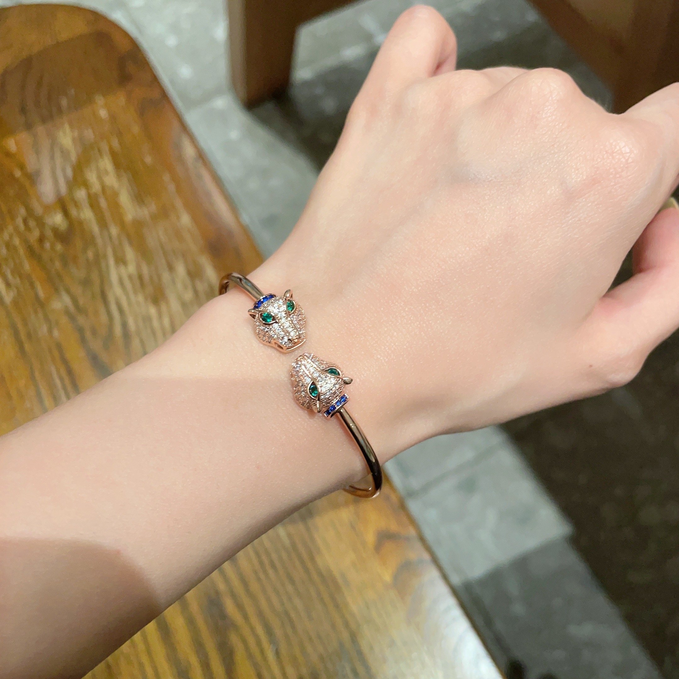 Cartier Panthere de Cartier bracelet Rose gold with pave diamonds emerald eyes blue sapphire accents 17cm