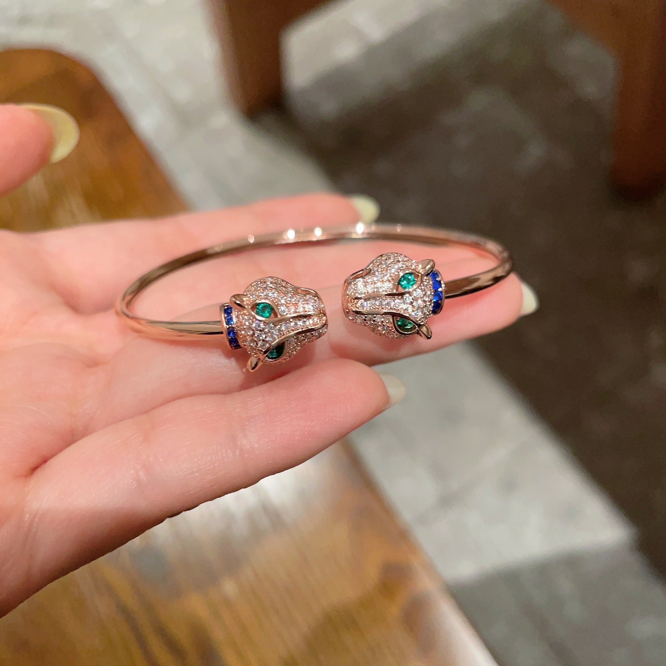 Cartier Panthere de Cartier bracelet Rose gold with pave diamonds emerald eyes blue sapphire accents 17cm