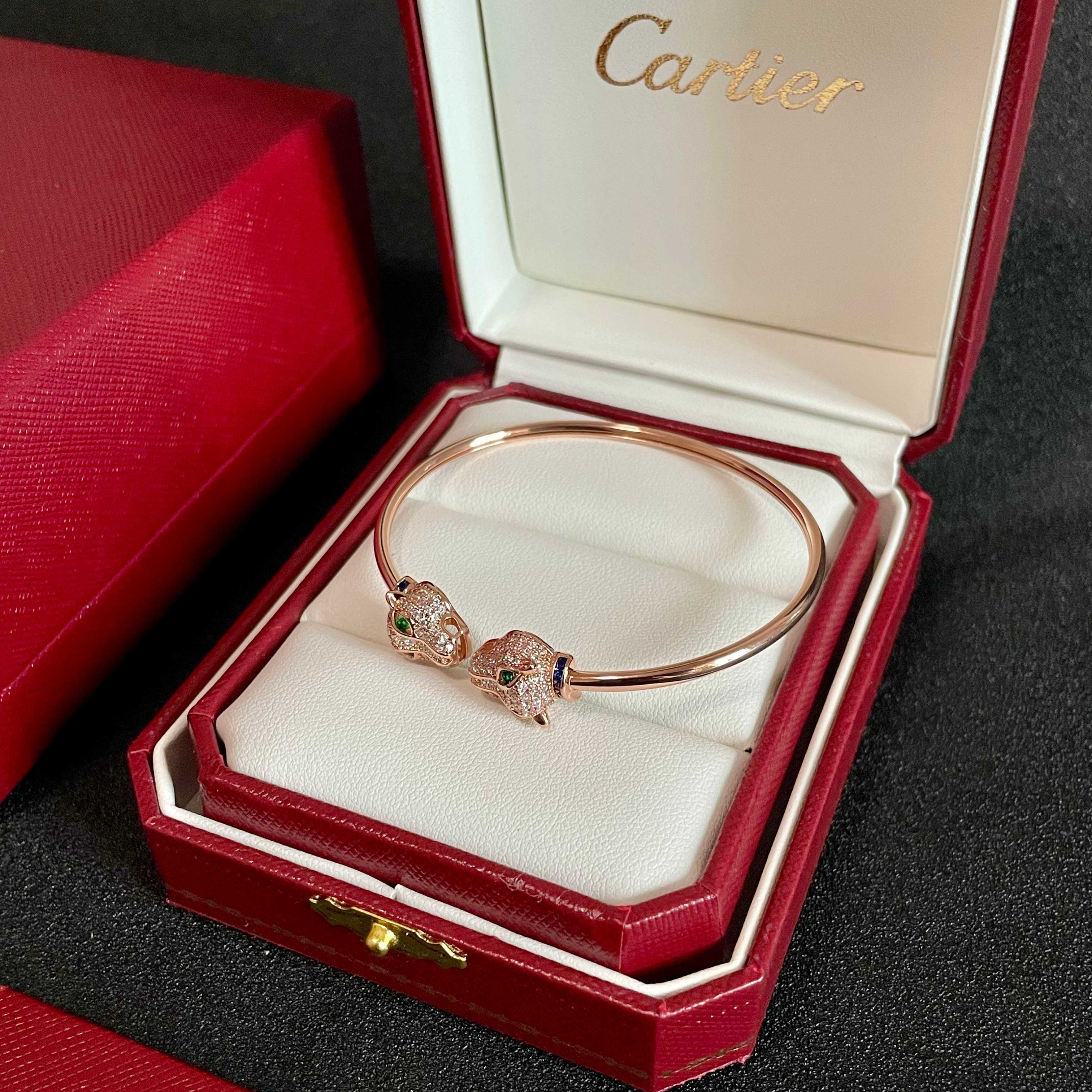 Cartier Panthere de Cartier bracelet Rose gold with pave diamonds emerald eyes blue sapphire accents 17cm