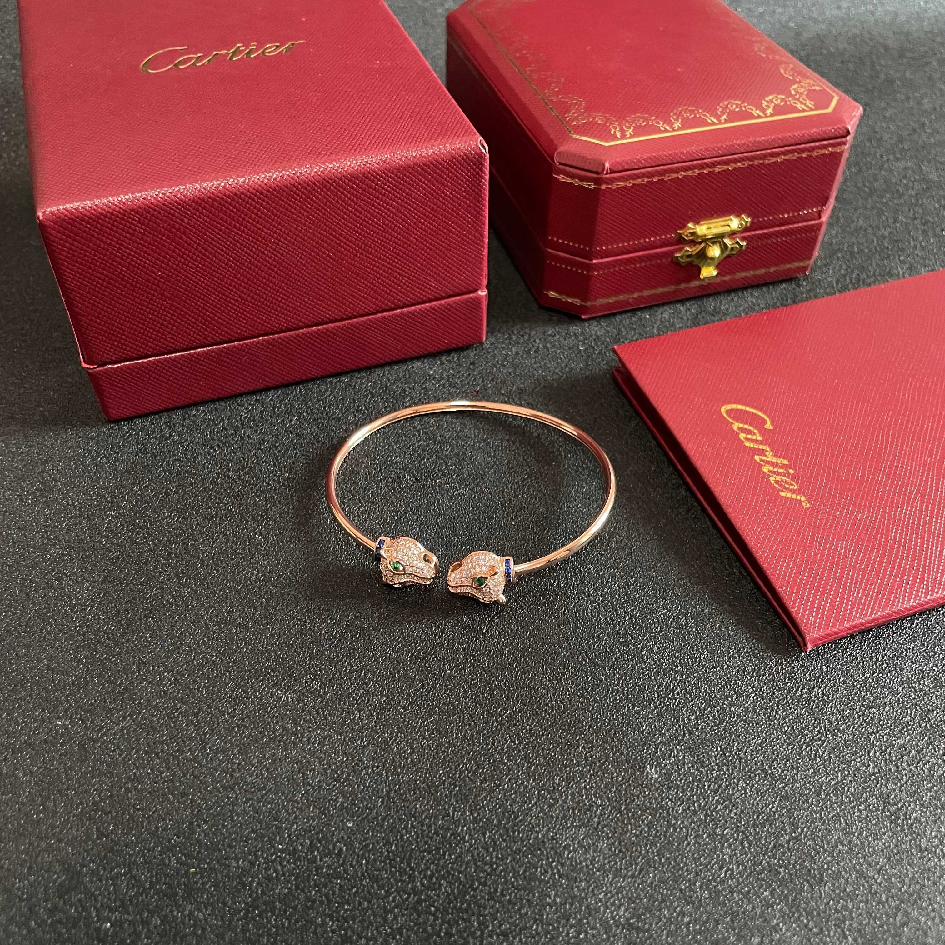 Cartier Panthere de Cartier bracelet Rose gold with pave diamonds emerald eyes blue sapphire accents 17cm