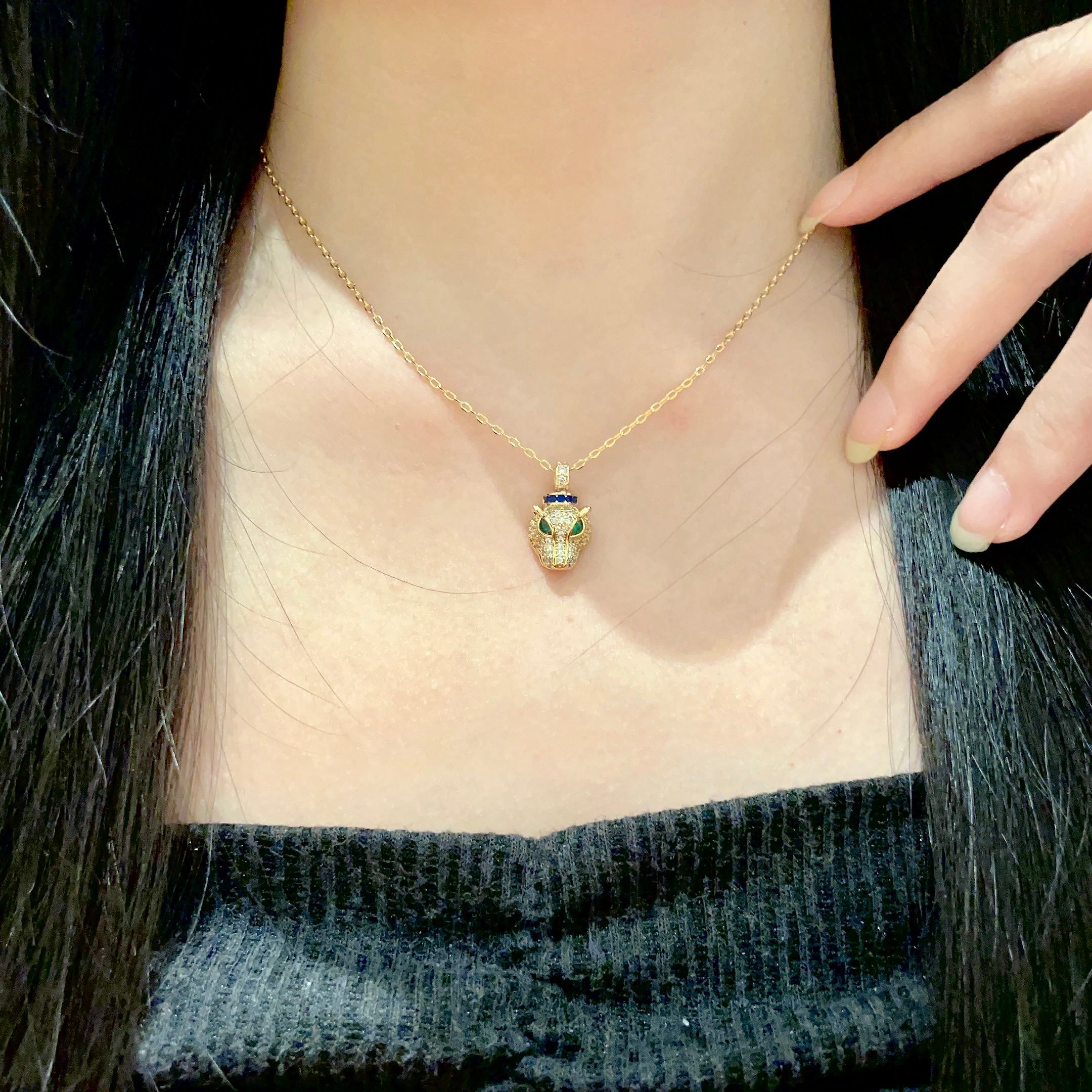 Cartier Panthere de Cartier necklace 18K yellow gold set with pave diamonds green tsavorite garnet eyes blue sapphire accents 40cm
