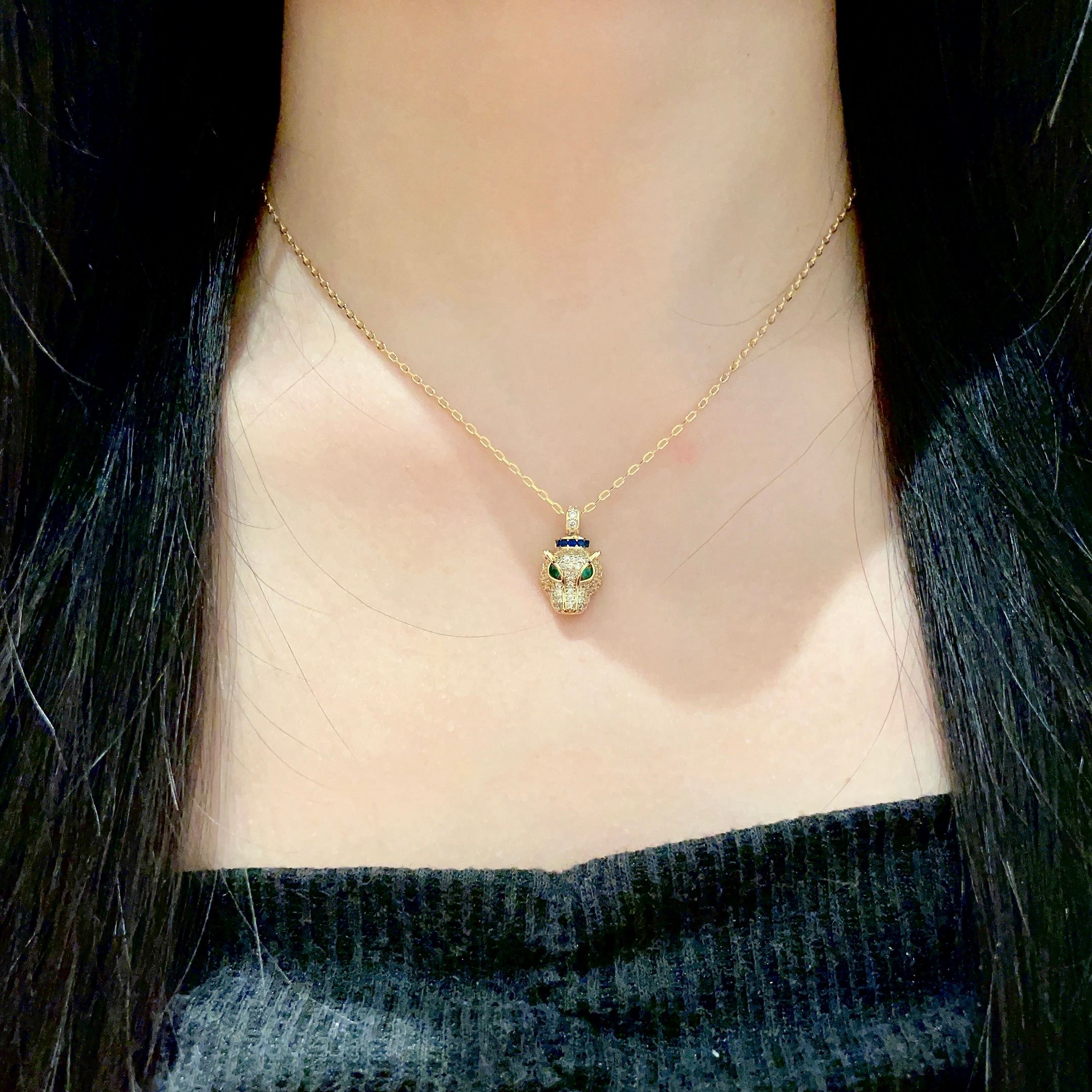 Cartier Panthere de Cartier necklace 18K yellow gold set with pave diamonds green tsavorite garnet eyes blue sapphire accents 40cm