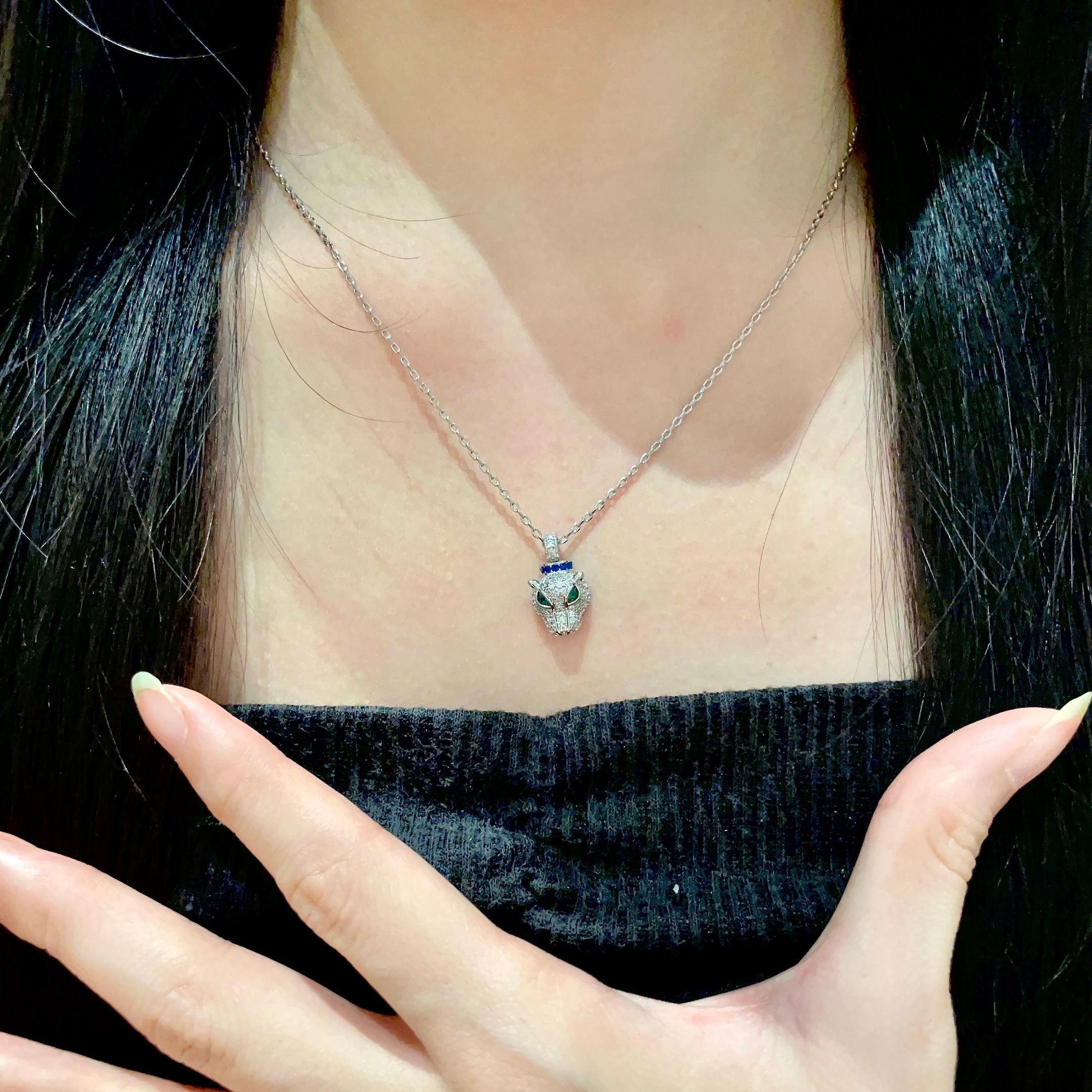 Cartier Panthere de Cartier necklace 18K white gold pave diamonds emerald eyes blue sapphire accent 42cm