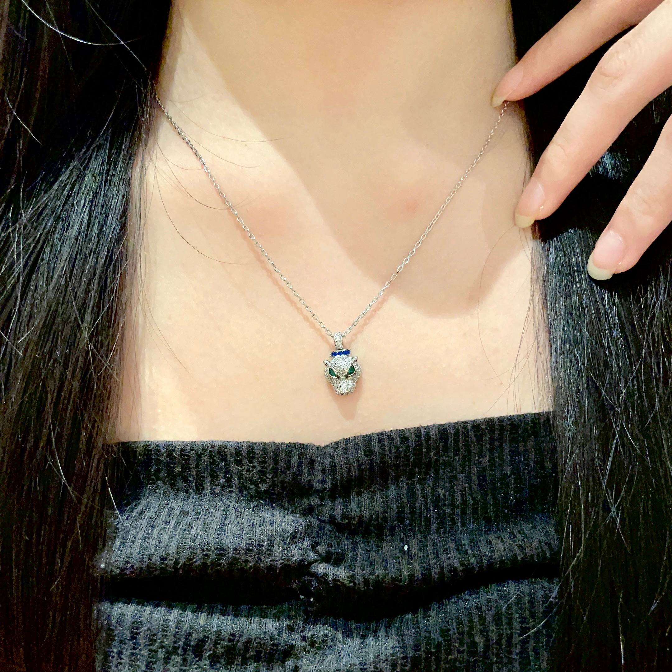 Cartier Panthere de Cartier necklace 18K white gold pave diamonds emerald eyes blue sapphire accent 42cm