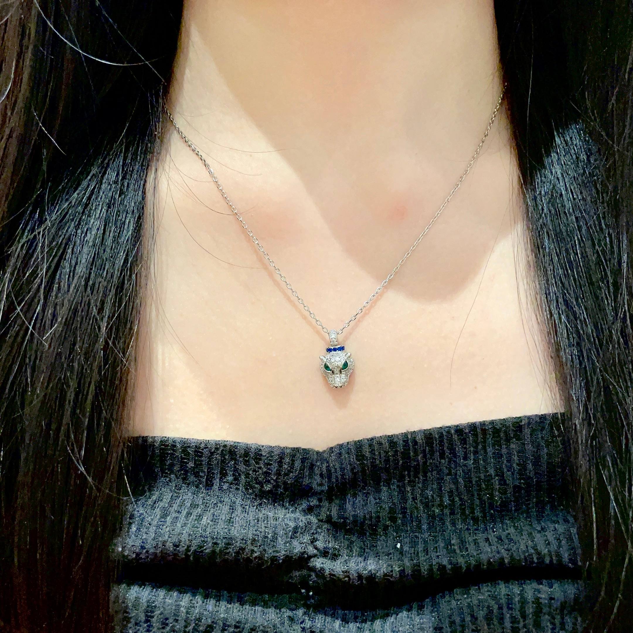 Cartier Panthere de Cartier necklace 18K white gold pave diamonds emerald eyes blue sapphire accent 42cm