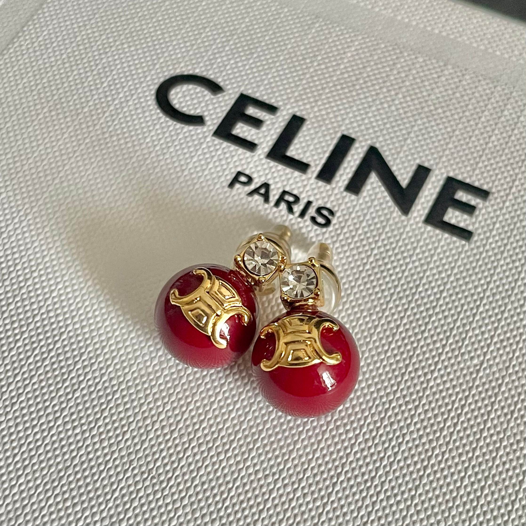 Celine Triomphe Red Bead Stud Earrings earrings gold-tone metal deep red resin bead clear faceted crystal accent 10mm bead diameter standard stud post length