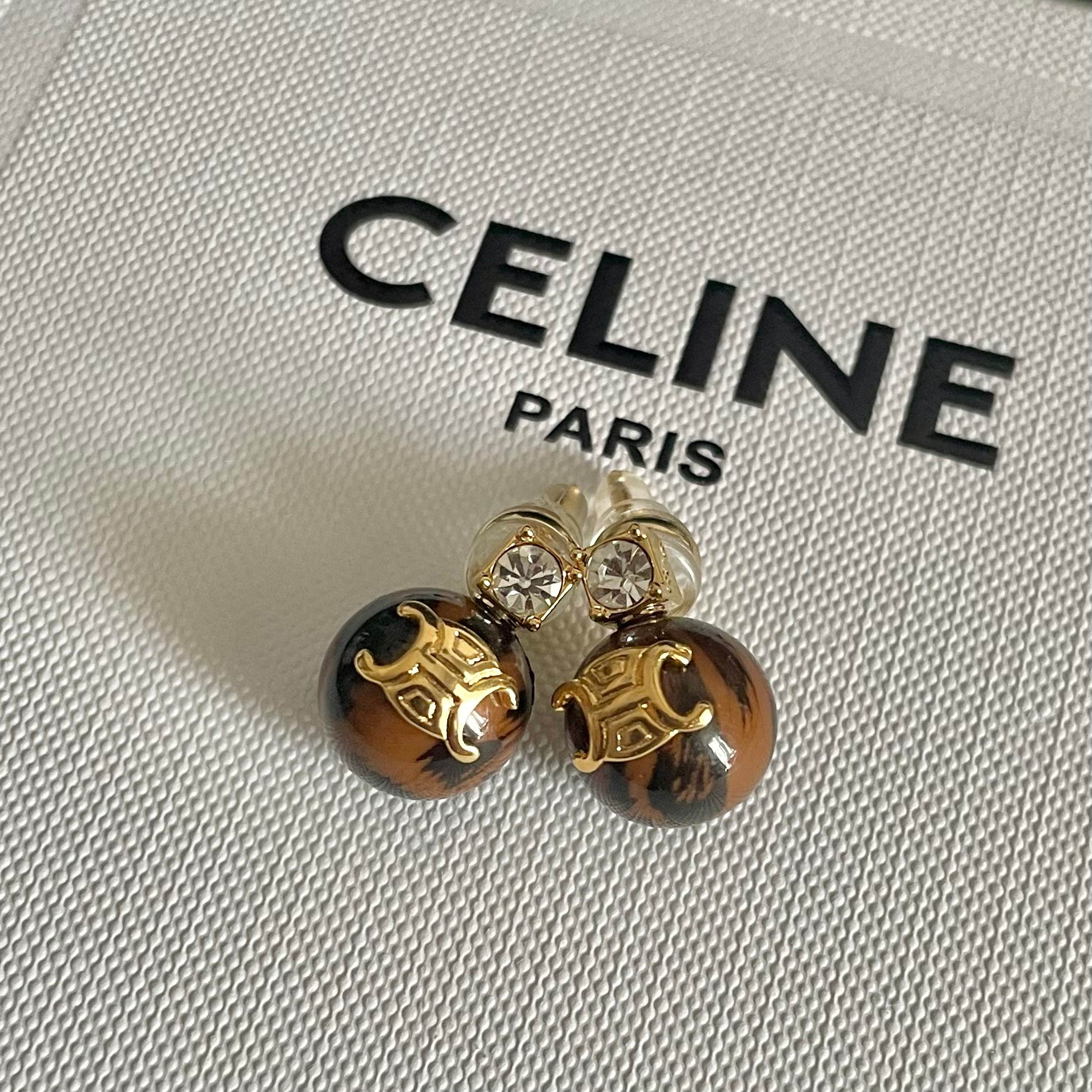 Celine Triomphe Resin Ball Stud Earrings earrings gold-tone metal tortoiseshell brown resin clear cubic zirconia accent 10mm ball diameter standard stud post length