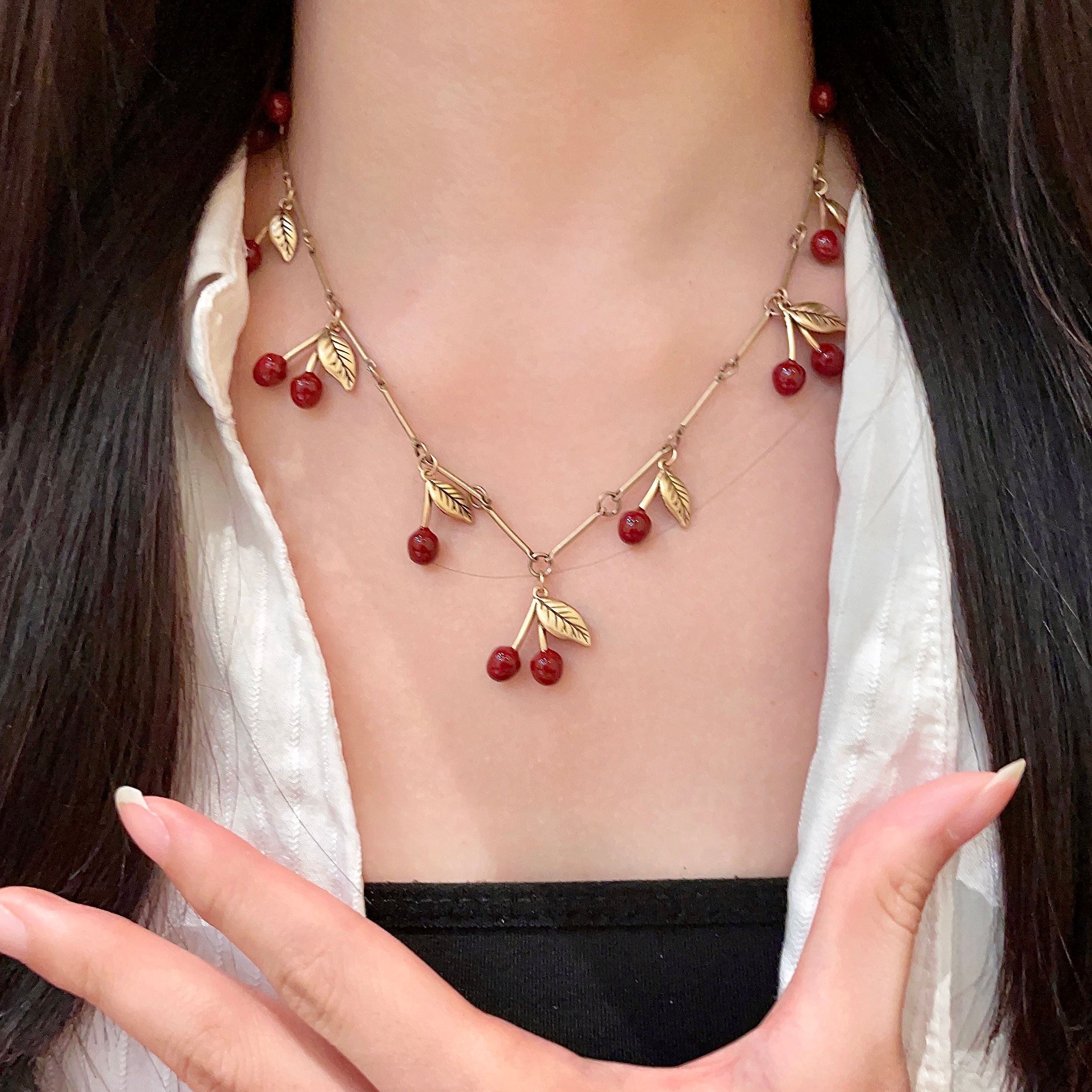 Saint Laurent 1961 Cherry Charm necklace antique gold metal deep red enamel cherry charms 42cm