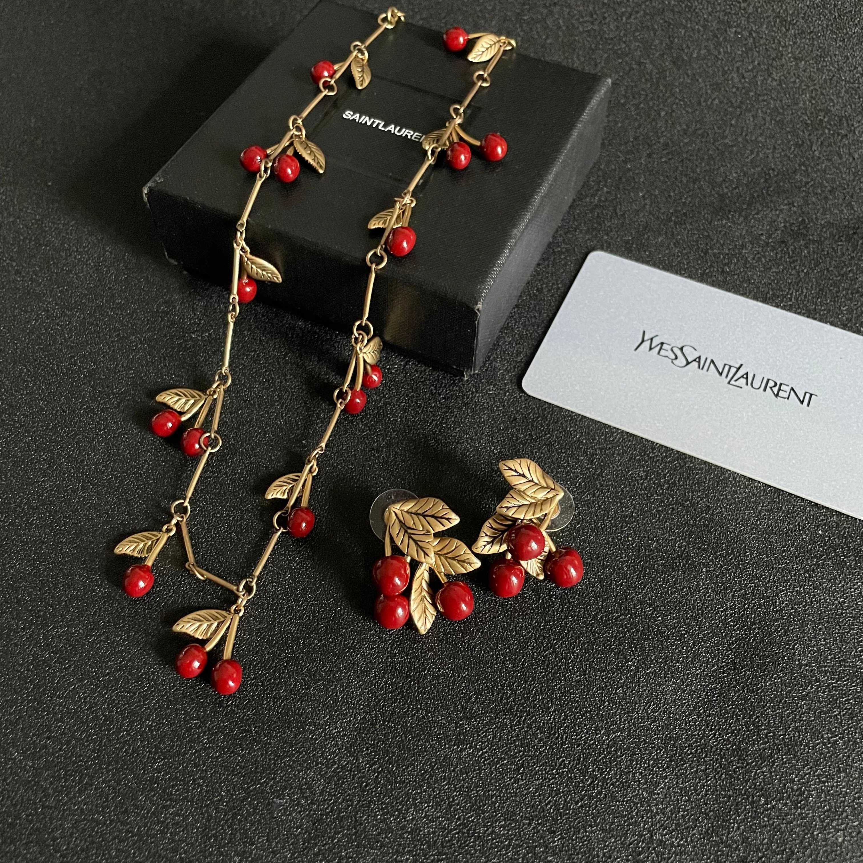 Saint Laurent 1961 Cherry Charm necklace antique gold metal deep red enamel cherry charms 42cm