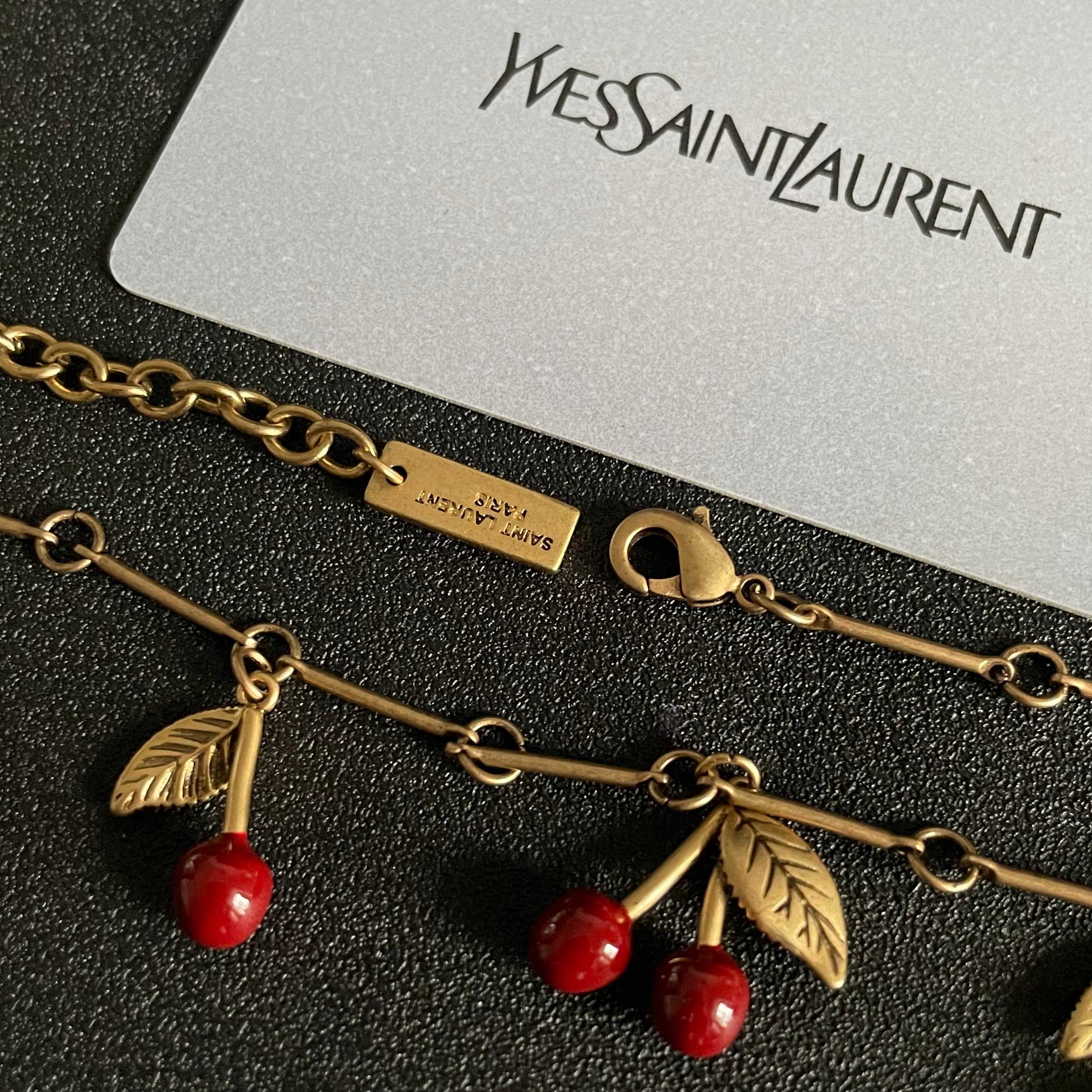 Saint Laurent 1961 Cherry Charm necklace antique gold metal deep red enamel cherry charms 42cm