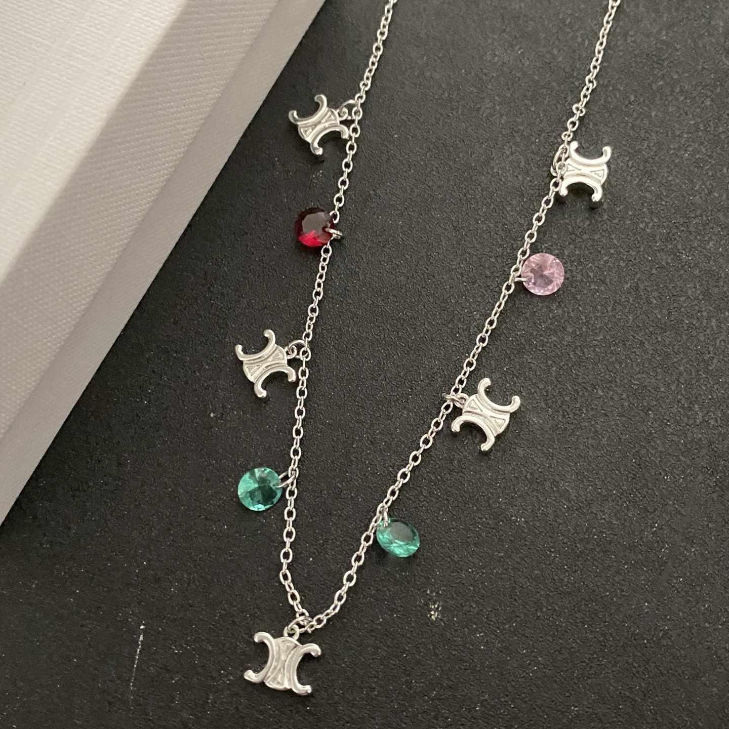 Celine Triomphe Multi Charm necklace Silver-toned metal with red pink and green faceted stone charms 45cm