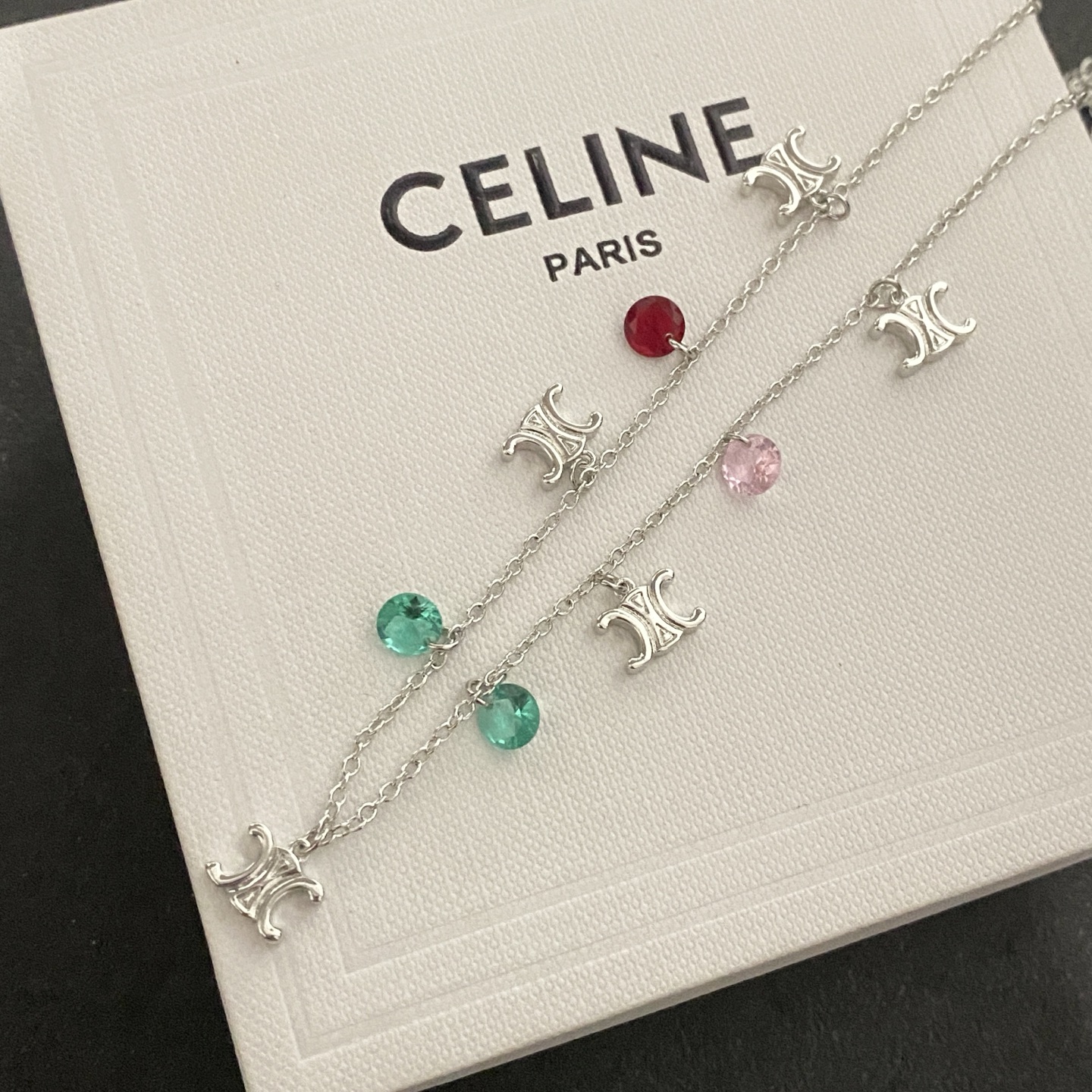 Celine Triomphe Multi Charm necklace Silver-toned metal with red pink and green faceted stone charms 45cm