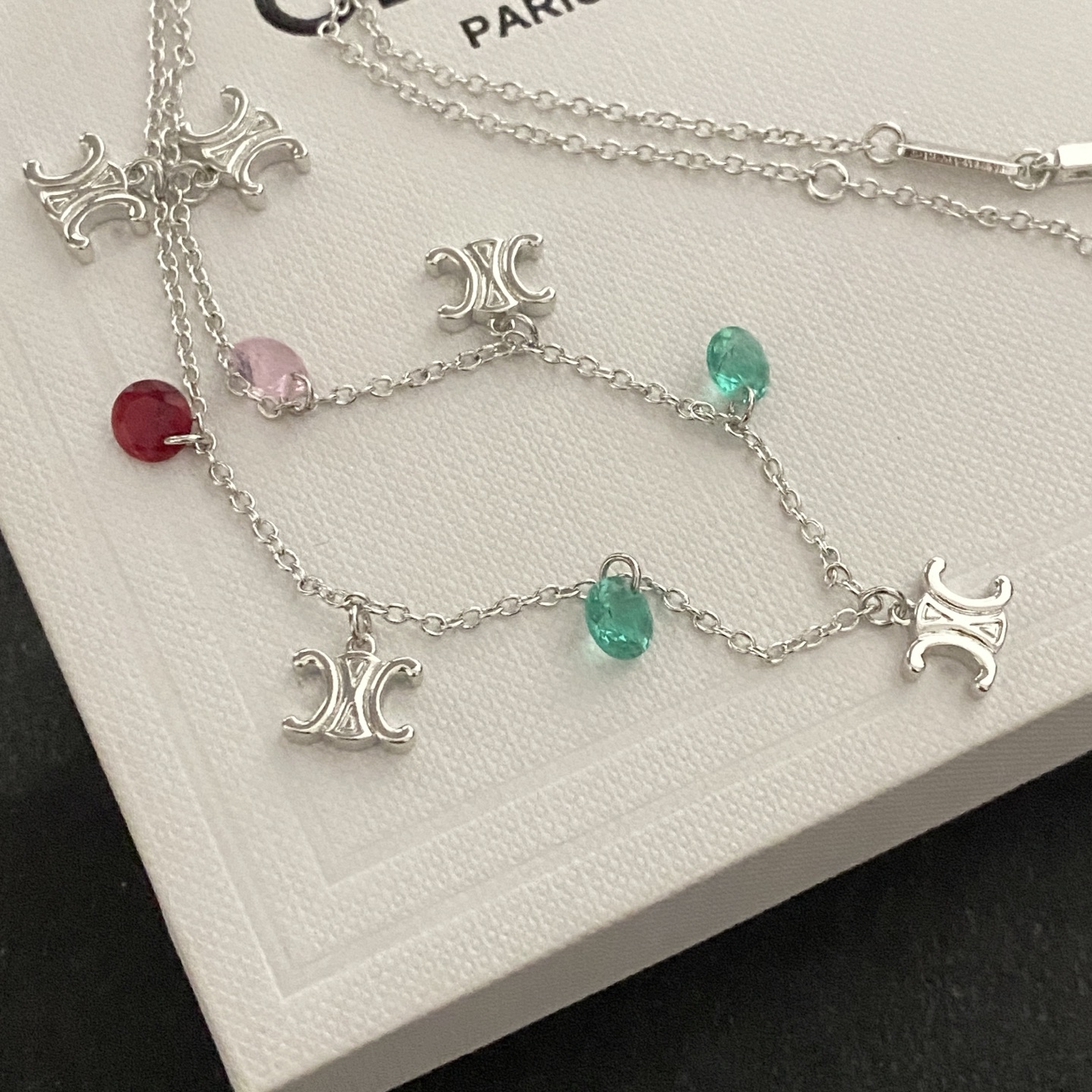 Celine Triomphe Multi Charm necklace Silver-toned metal with red pink and green faceted stone charms 45cm