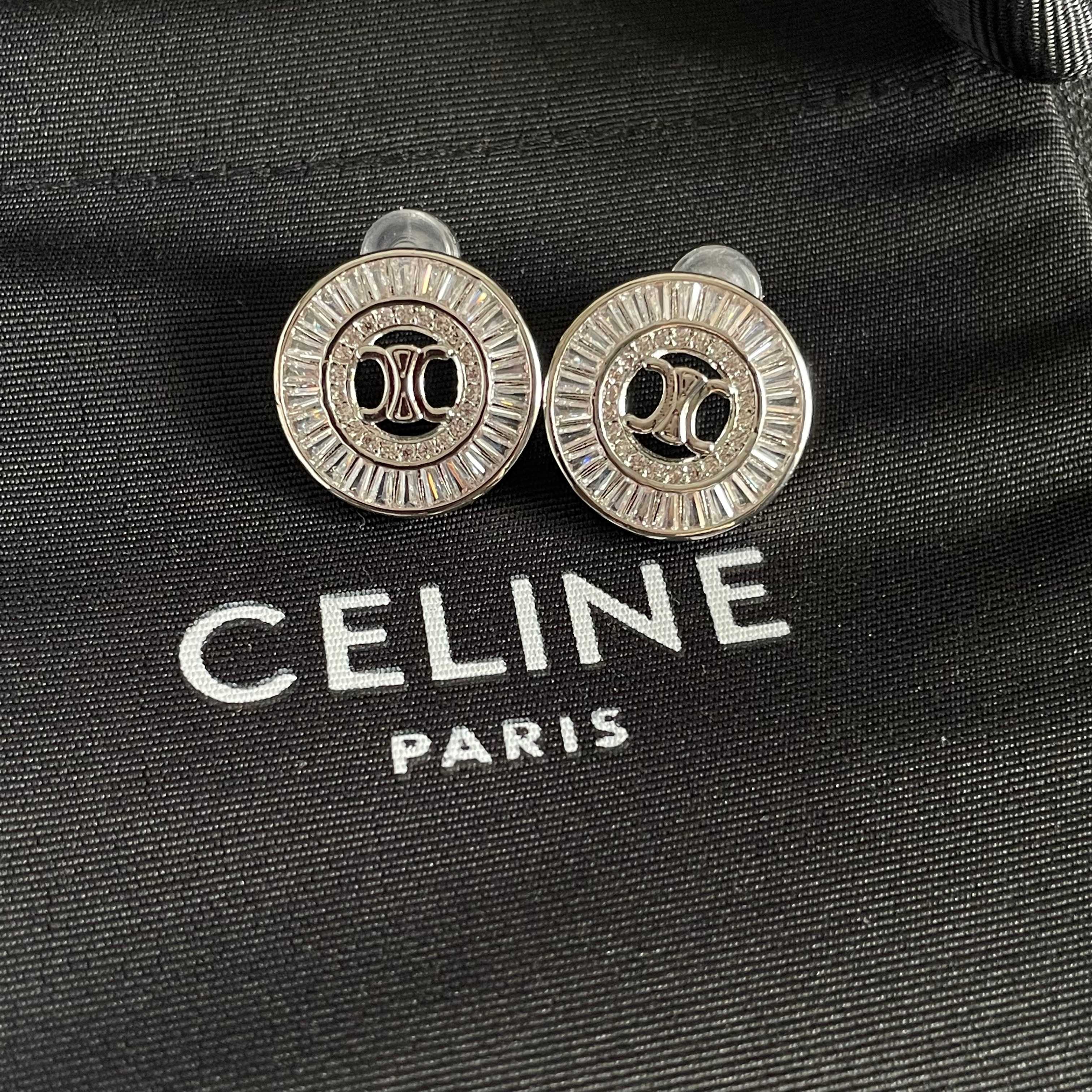 Celine Triomphe Baguette Crystal Stud Earrings earrings Two variants gold-tone metal with clear baguette-cut crystals silver-tone metal with clear baguette-cut crystals 1 5cm diameter