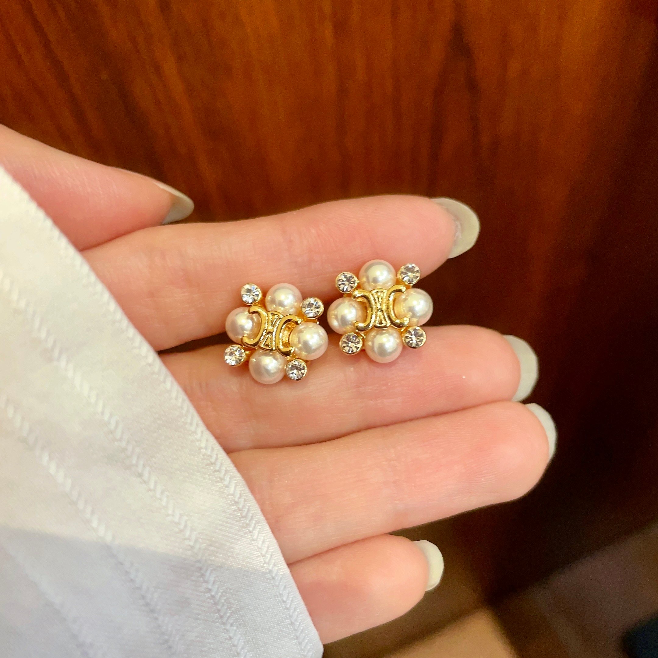 Celine Triomphe Pearl Cluster Stud Earrings earrings gold-tone metal with cream white pearls and clear crystal accents 1cm diameter