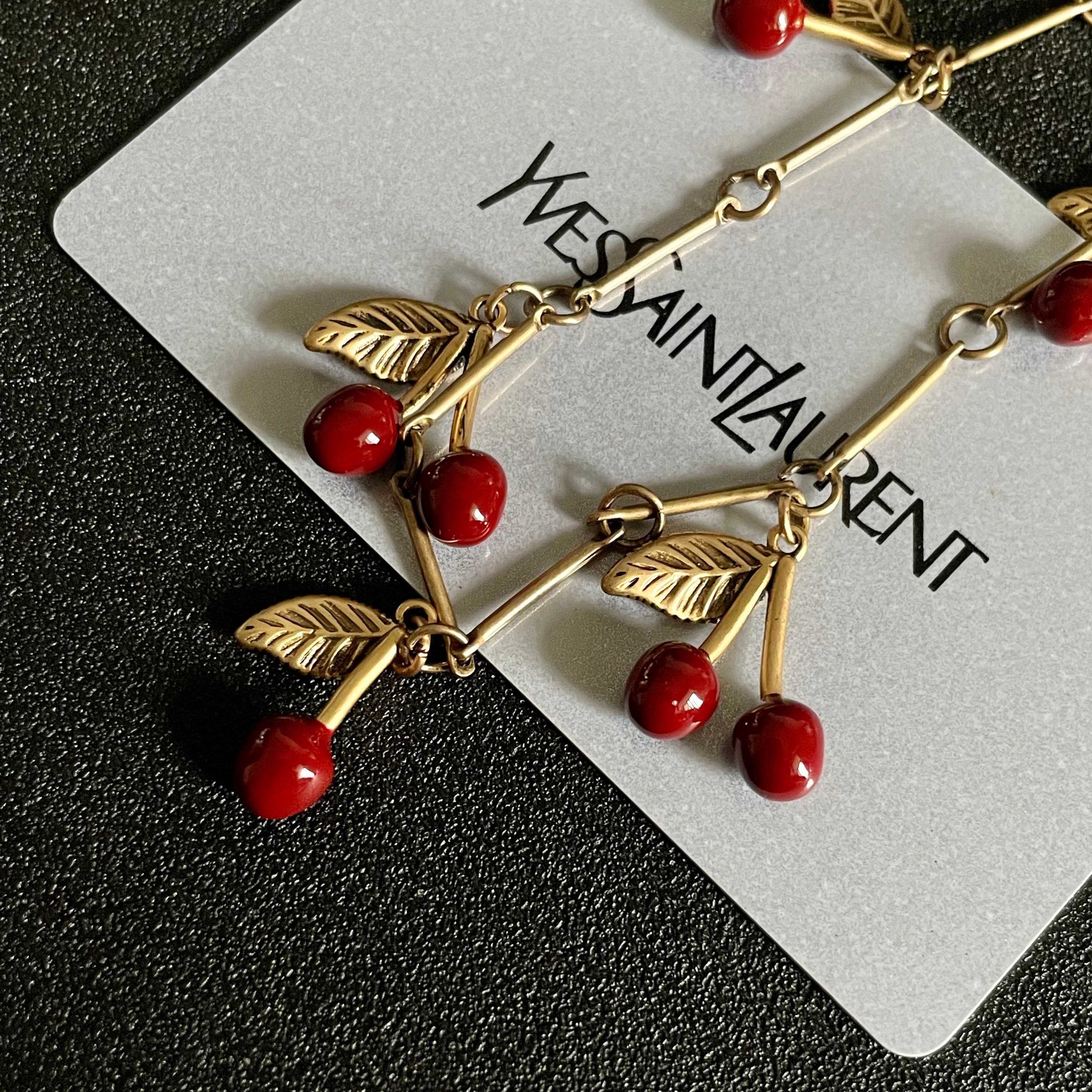 Saint Laurent Cherry Charm necklace antique gold tone metal deep red enamel cherry accents 42cm with 5cm extender