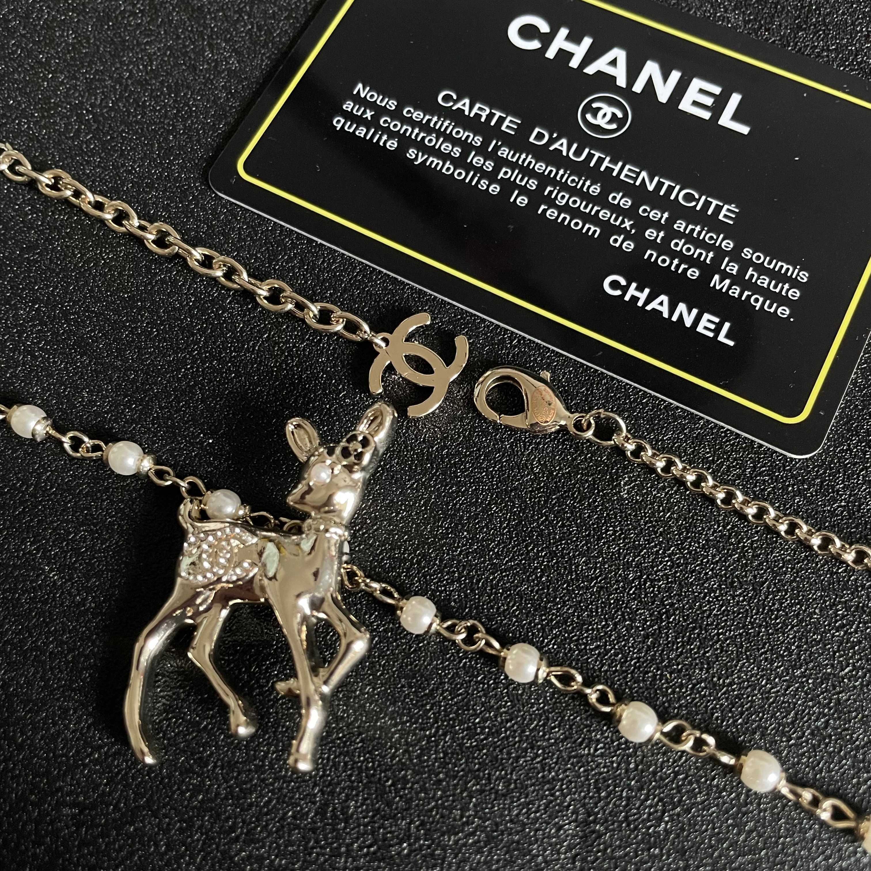 Chanel CC Logo Bambi Deer Pearl Pendant necklace Light gold-tone metal white faux pearls clear crystals black enamel accents 42cm