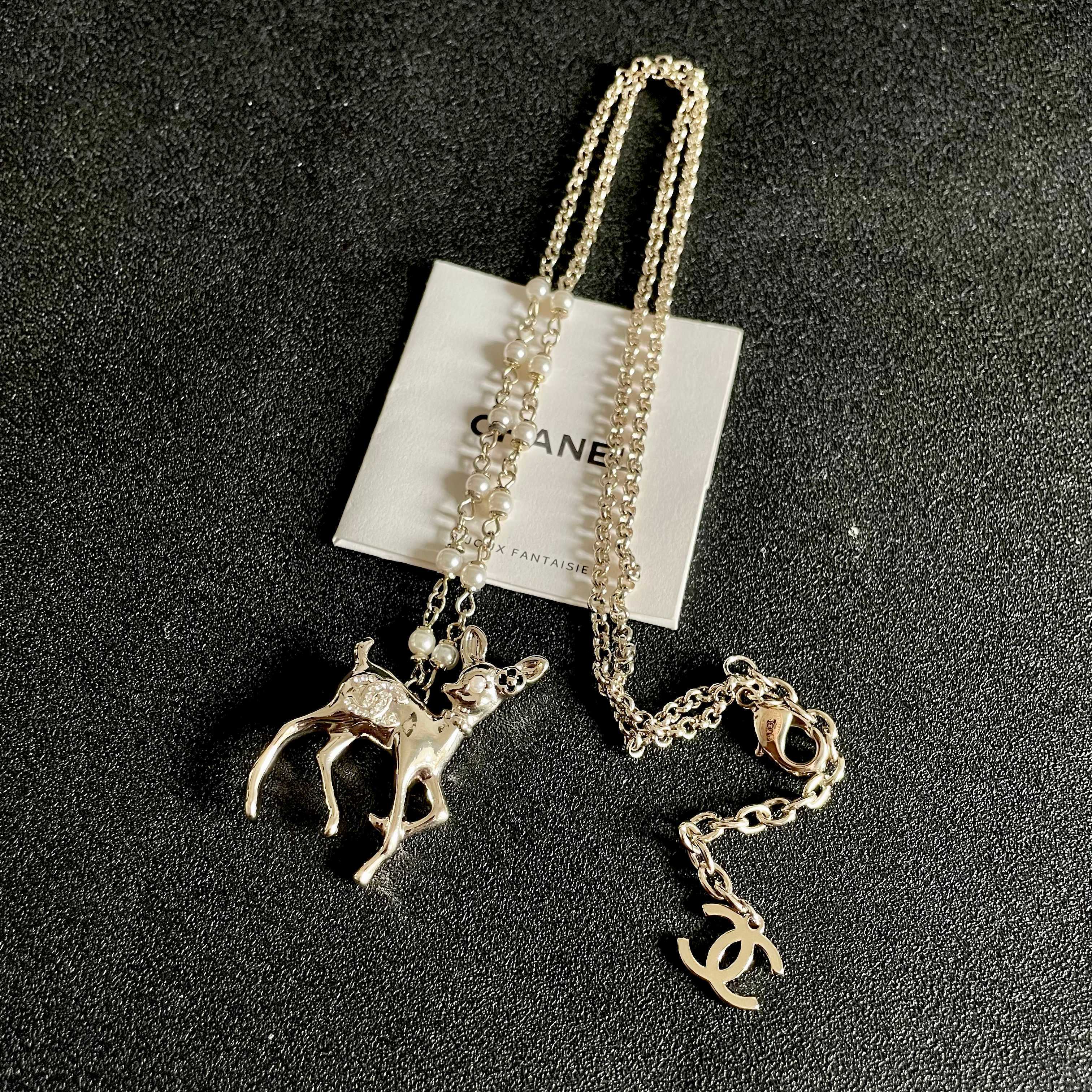 Chanel CC Logo Bambi Deer Pearl Pendant necklace Light gold-tone metal white faux pearls clear crystals black enamel accents 42cm