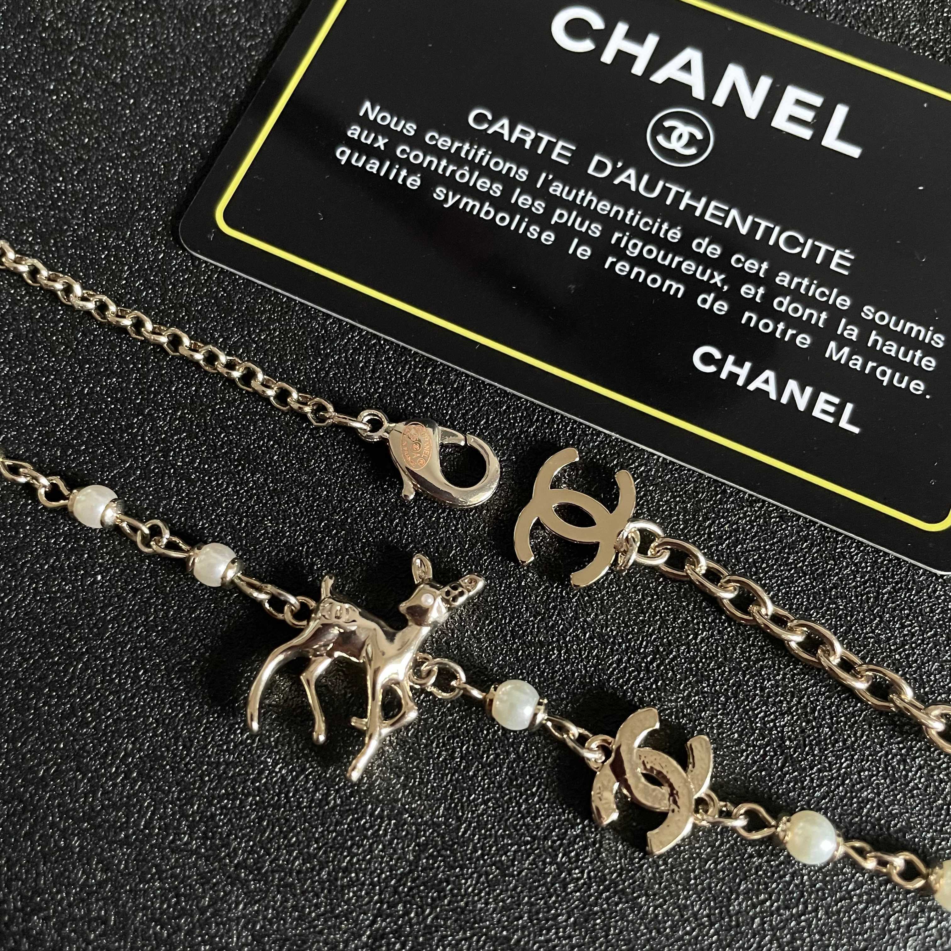 Chanel CC Logo Deer Charm Pearl Choker necklace light gold metal white faux pearl clear crystal 40cm