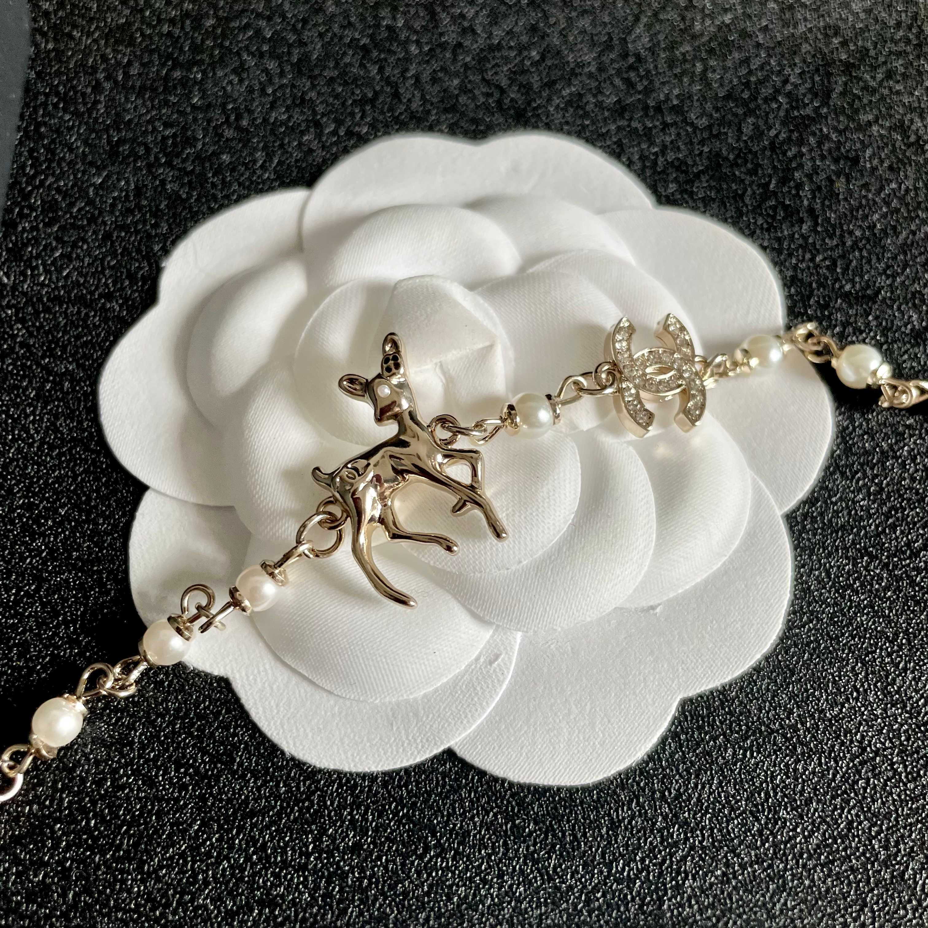 Chanel CC Logo Deer Charm Pearl Choker necklace light gold metal white faux pearl clear crystal 40cm