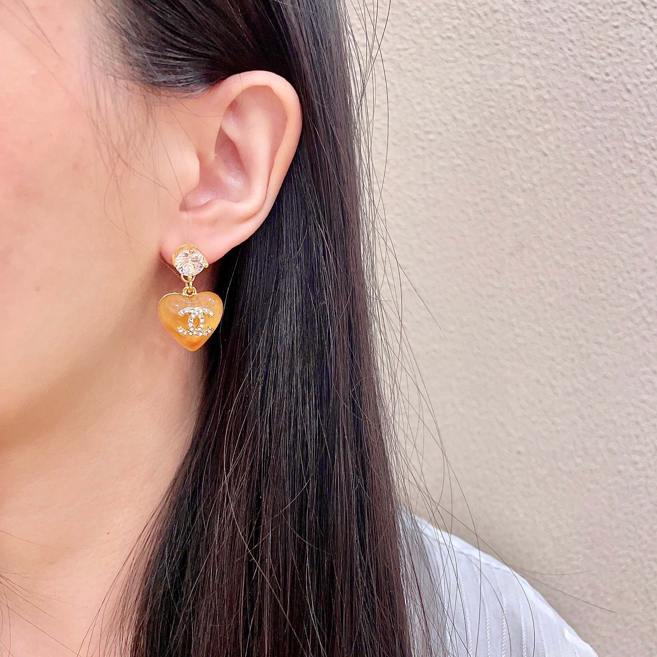 Chanel CC Logo Resin Heart Drop Earrings earrings gold tone metal orange translucent resin clear crystal accents 2 5cm drop length