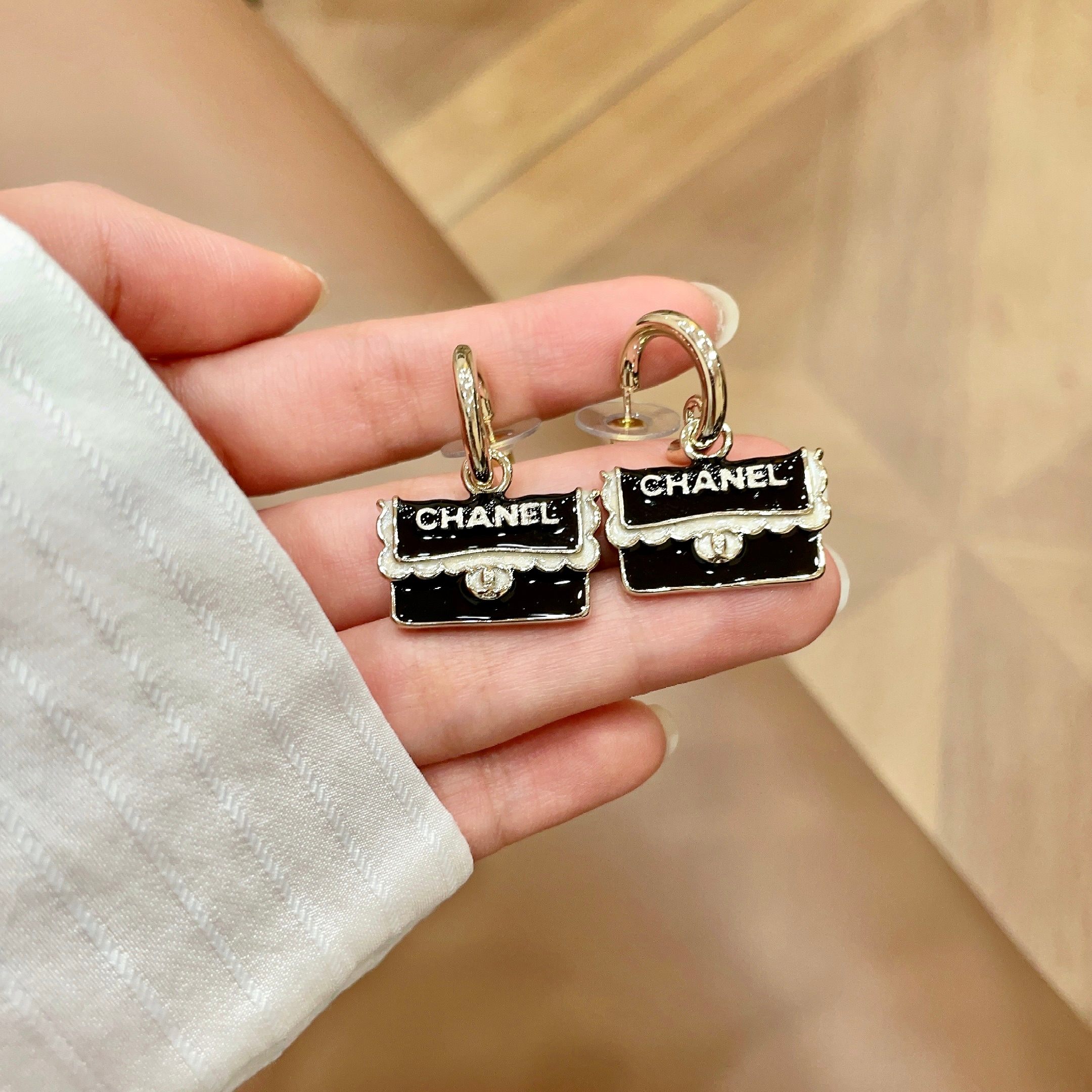 Chanel Classic Flap Bag Charm Drop Earrings earrings light gold tone metal black enamel white enamel detailing 1 5cm drop length