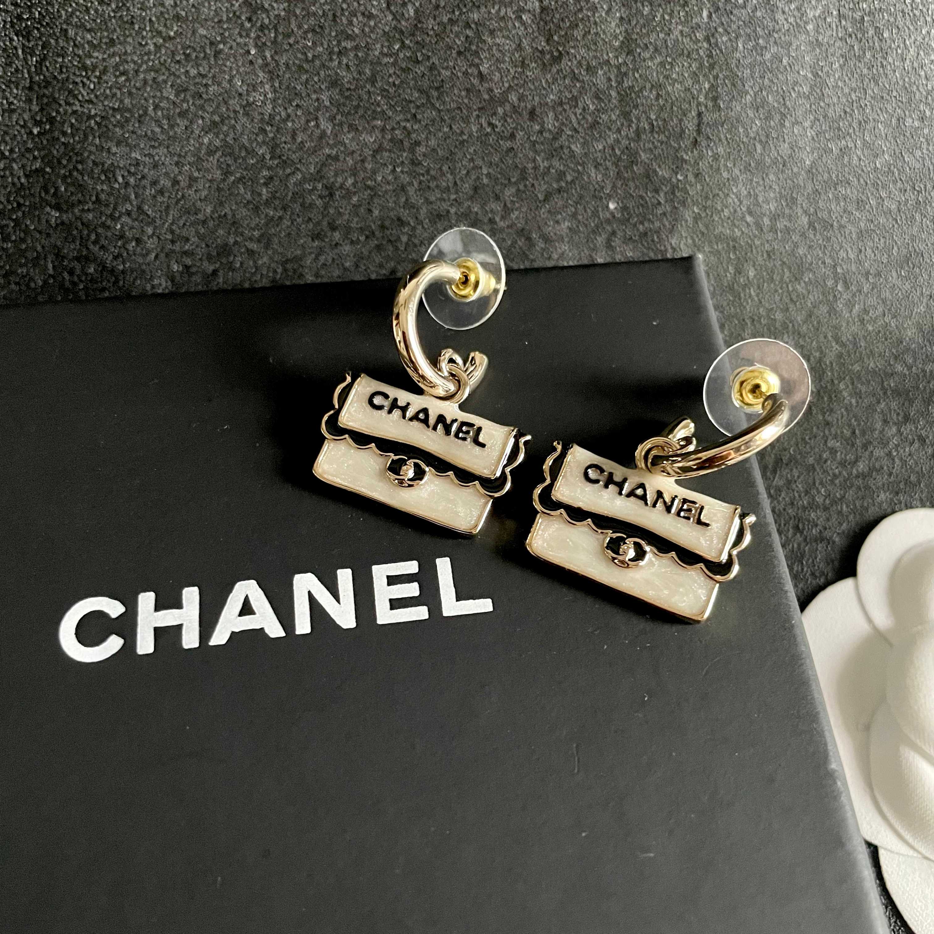 Chanel CC Logo Handbag Charm Drop Earrings earrings Light gold tone metal pearlescent white enamel black enamel lettering 1 5cm drop length