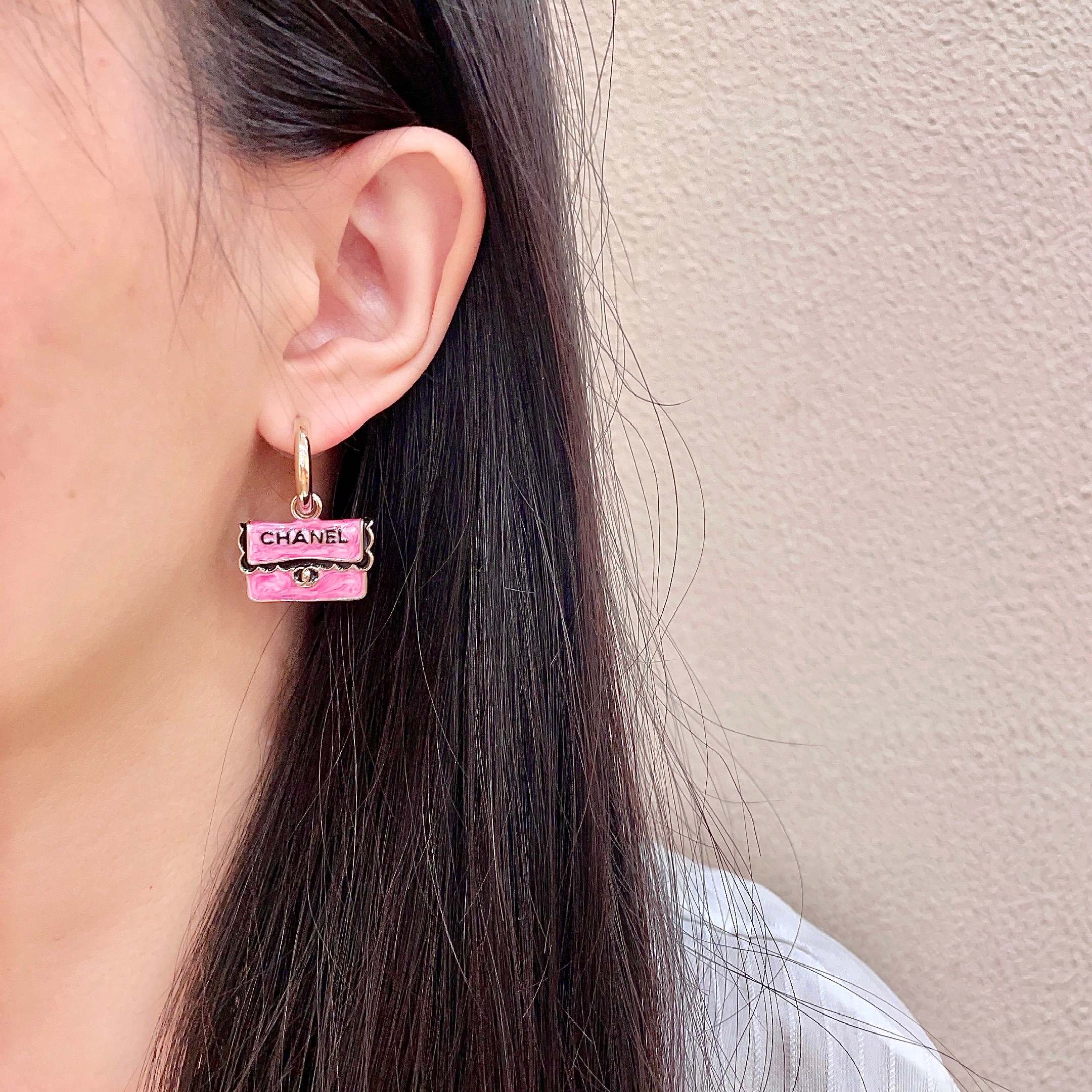 Chanel CC Logo Handbag Charm Drop Earrings earrings Gold-tone metal with pink enamel black enamel lettering and trim silver-tone turnlock detail 1 5cm hoop diameter 2cm total drop length