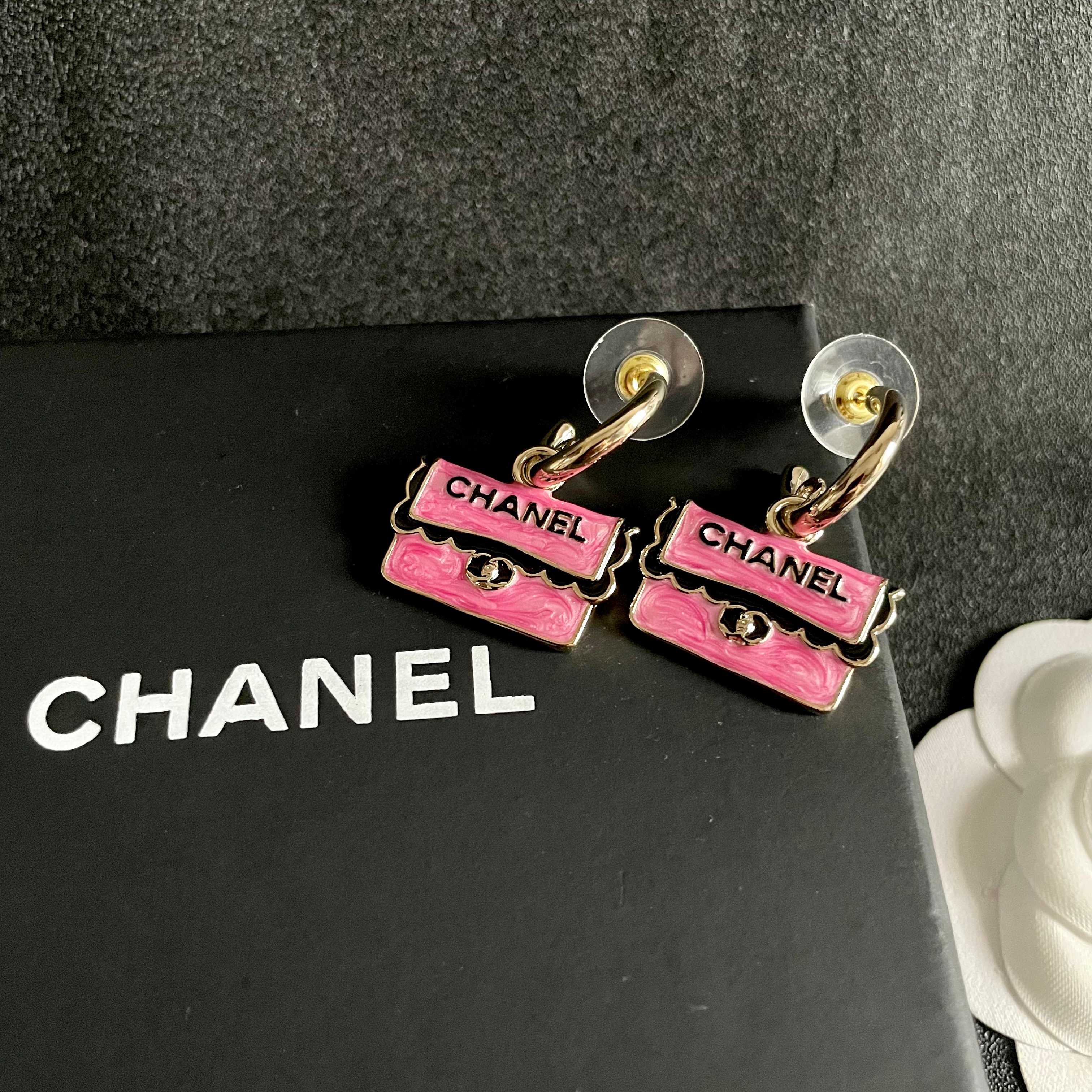 Chanel CC Logo Handbag Charm Drop Earrings earrings Gold-tone metal with pink enamel black enamel lettering and trim silver-tone turnlock detail 1 5cm hoop diameter 2cm total drop length