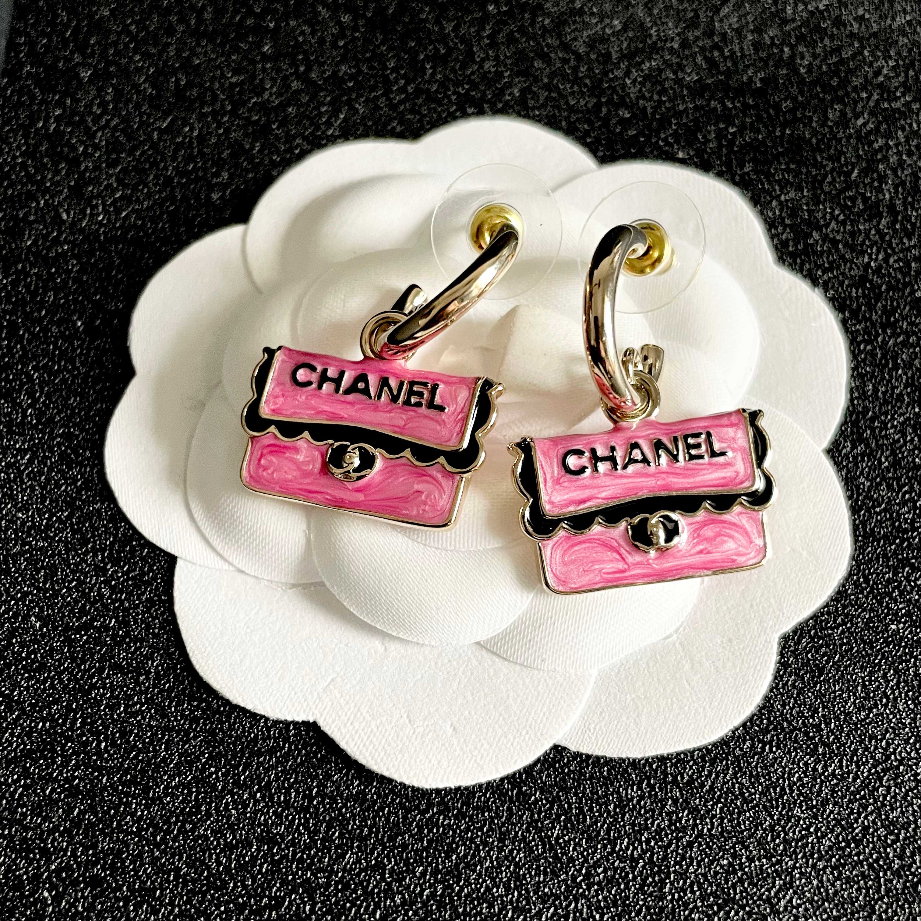 Chanel CC Logo Handbag Charm Drop Earrings earrings Gold-tone metal with pink enamel black enamel lettering and trim silver-tone turnlock detail 1 5cm hoop diameter 2cm total drop length