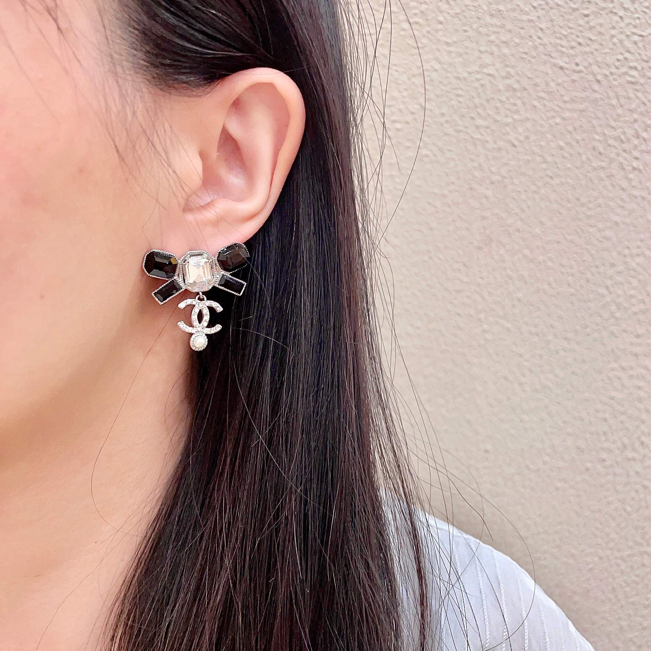 Chanel CC Logo Bow Drop Earrings earrings Silver-tone metal with black resin clear crystal and white pearl accents One Size 2 5cm drop length