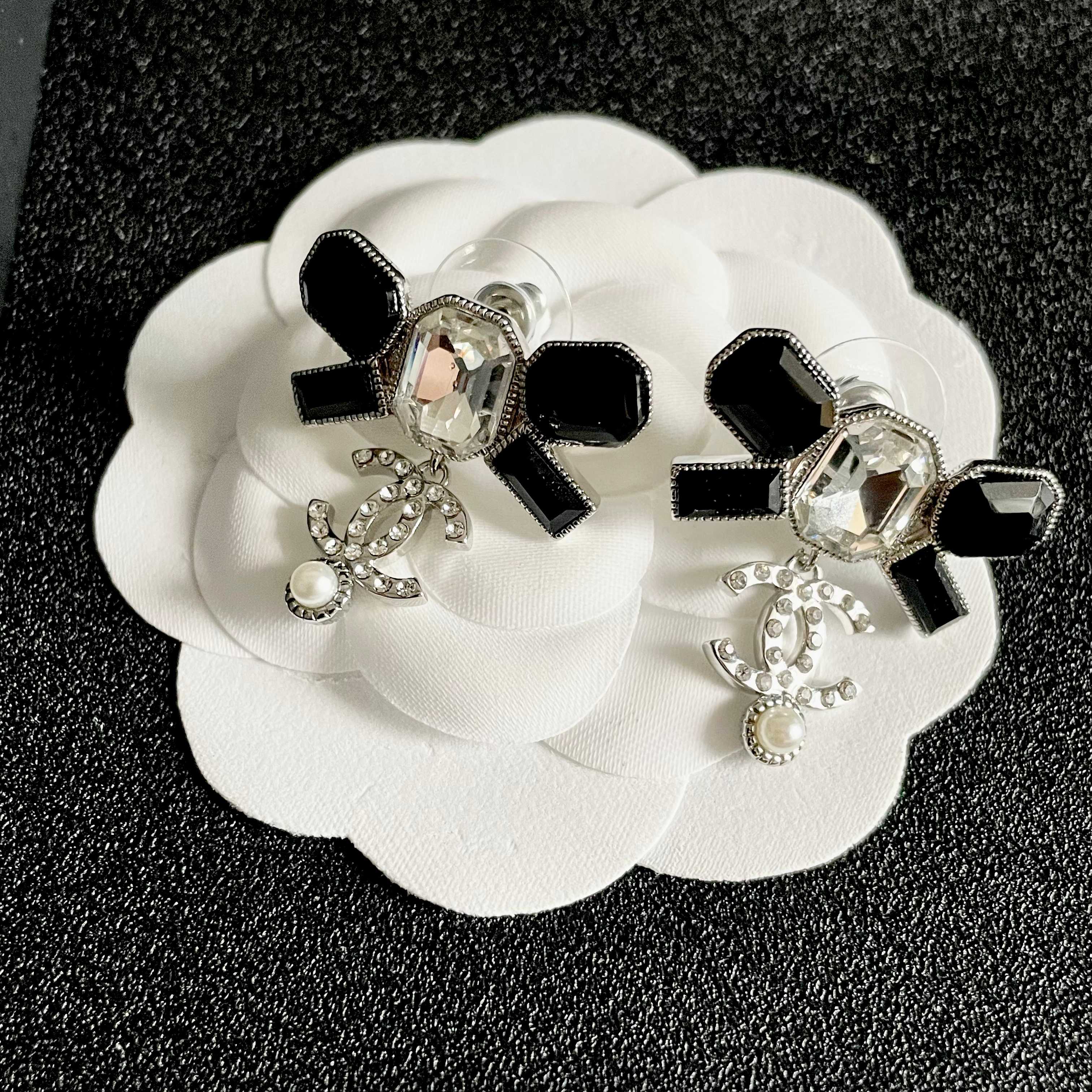 Chanel CC Logo Bow Drop Earrings earrings Silver-tone metal with black resin clear crystal and white pearl accents One Size 2 5cm drop length