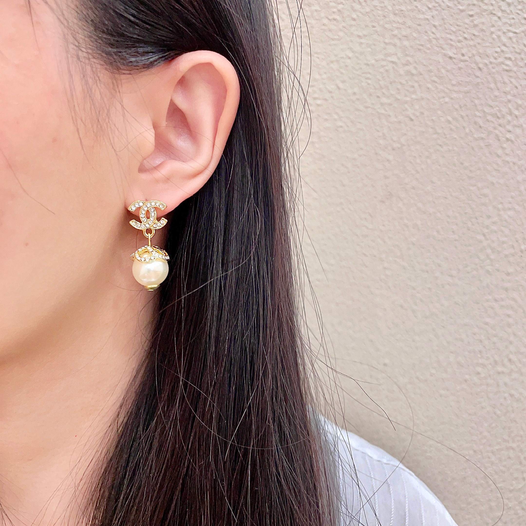 Chanel CC Logo Pearl Drop Earrings earrings gold-tone metal clear crystal cream white pearl 2 5cm drop length