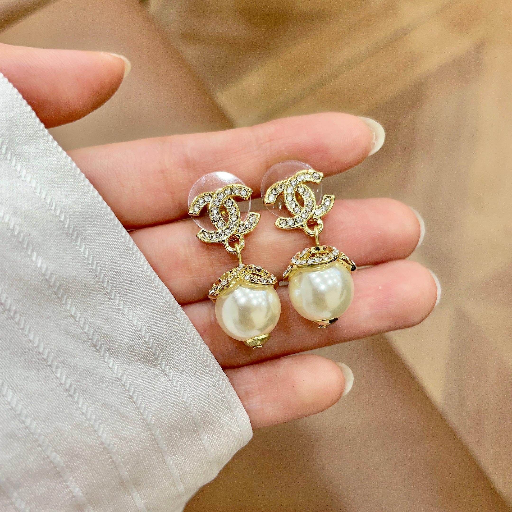 Chanel CC Logo Pearl Drop Earrings earrings gold-tone metal clear crystal cream white pearl 2 5cm drop length
