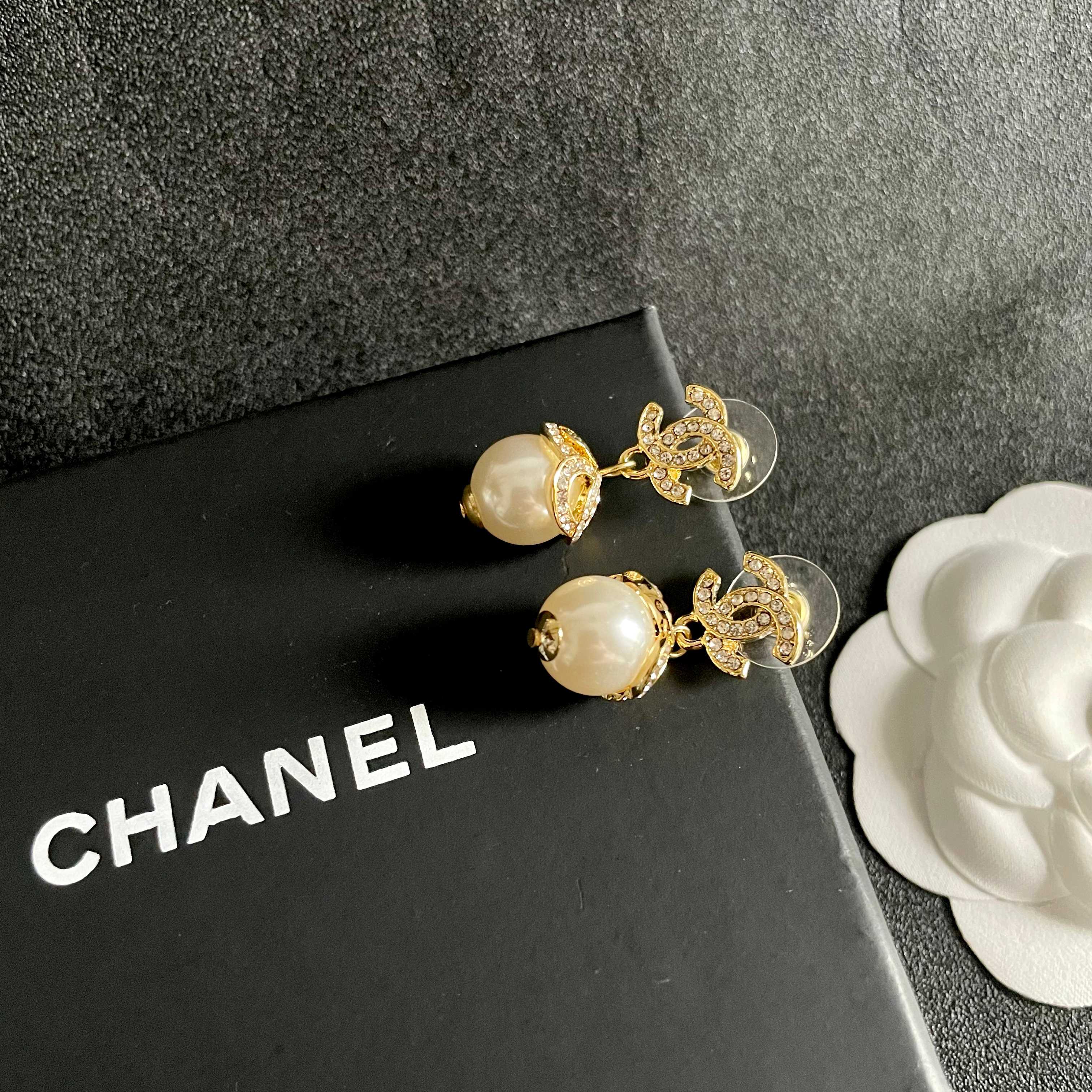 Chanel CC Logo Pearl Drop Earrings earrings gold-tone metal clear crystal cream white pearl 2 5cm drop length