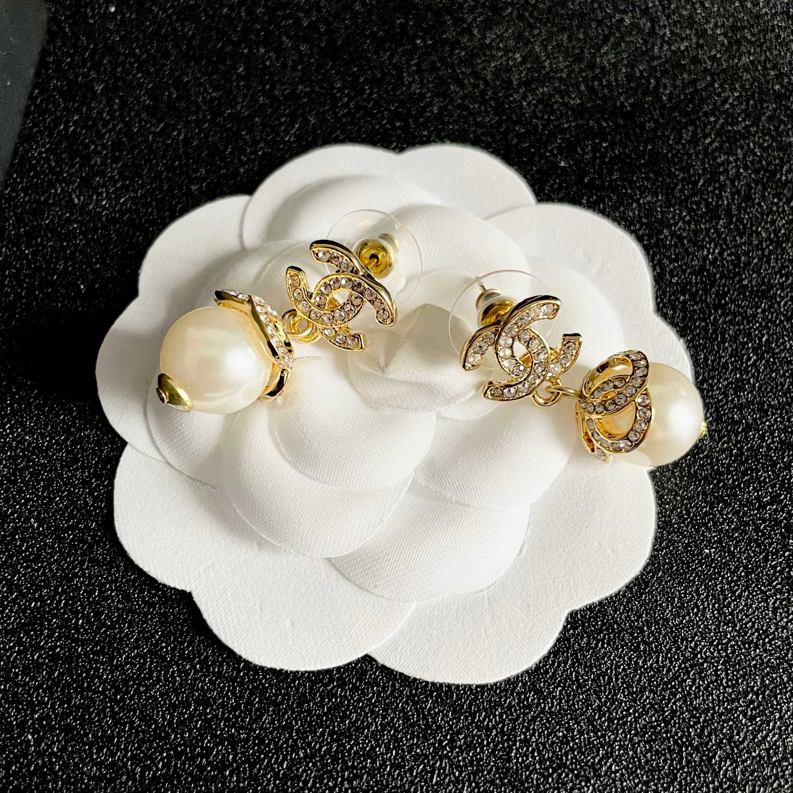 Chanel CC Logo Pearl Drop Earrings earrings gold-tone metal clear crystal cream white pearl 2 5cm drop length