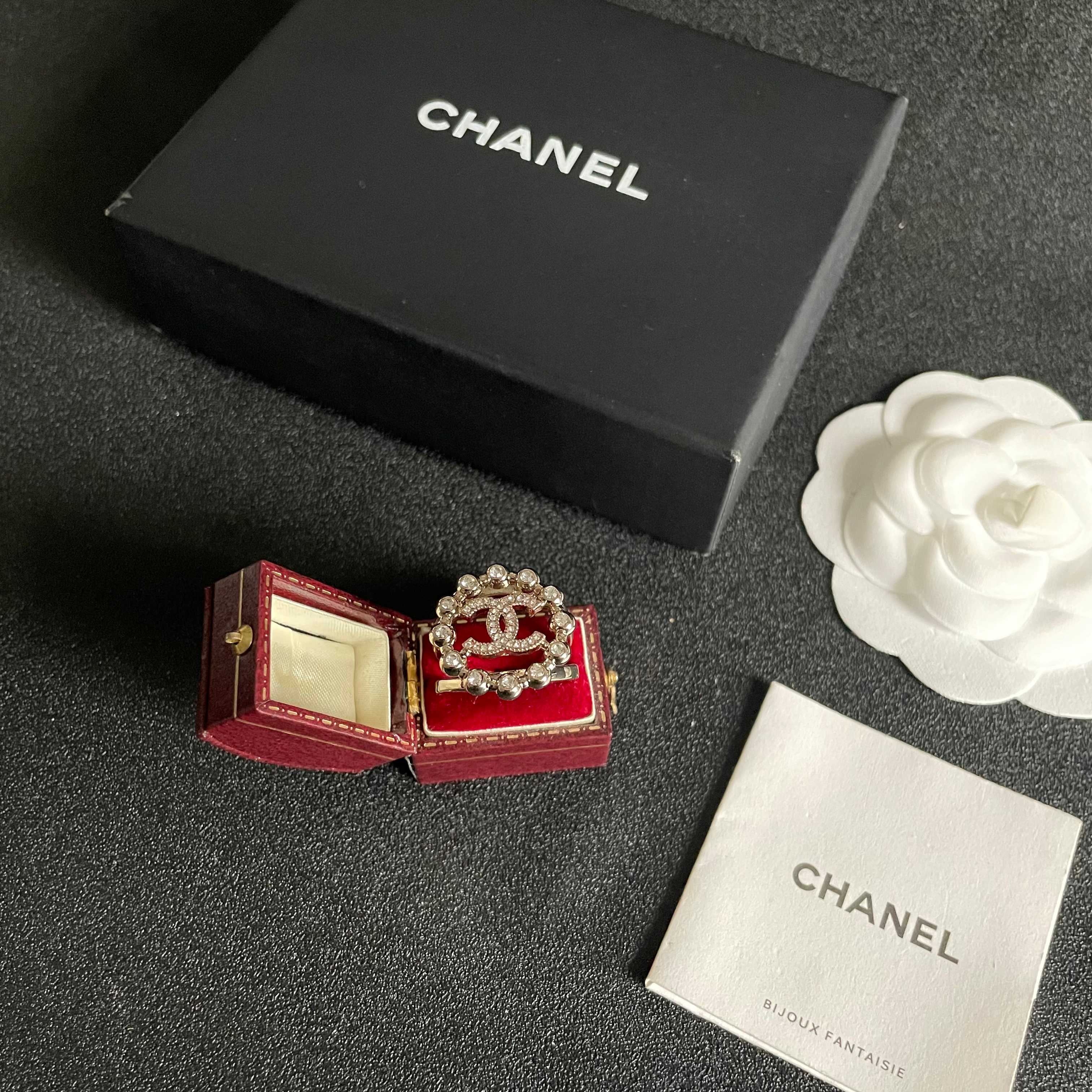 Chanel CC Logo Crystal Embellished Open Ring ring Light gold-tone metal with clear crystal accents Adjustable open band US size 7 equivalent