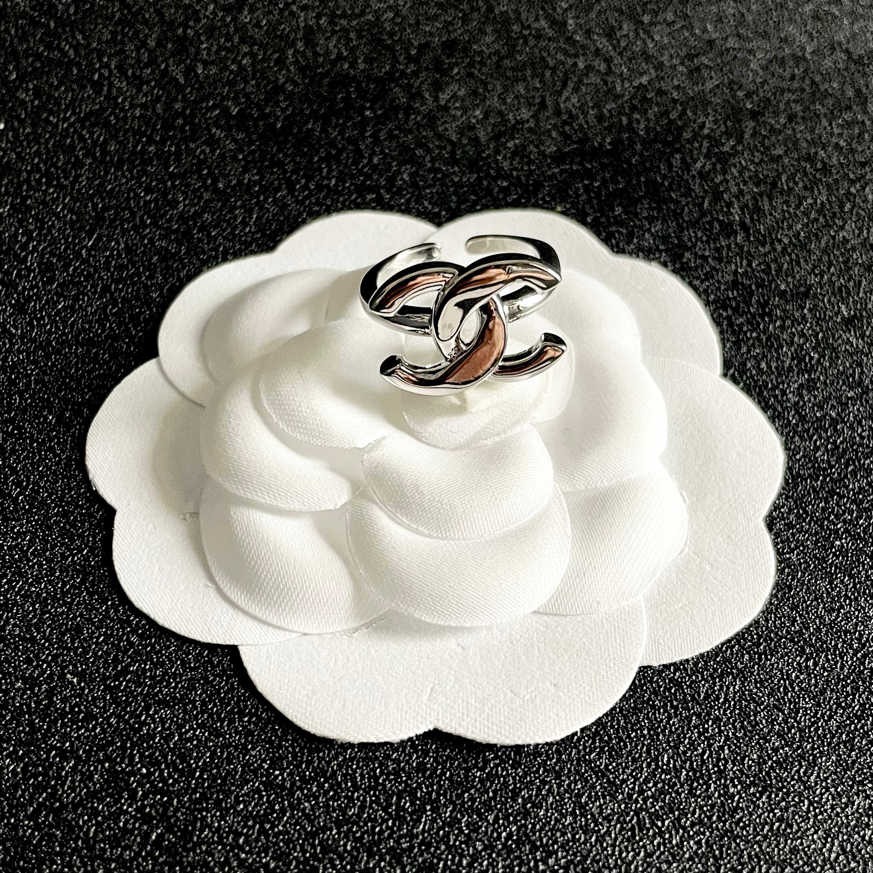 Chanel CC Logo ring silver tone metal no accent stones adjustable open band