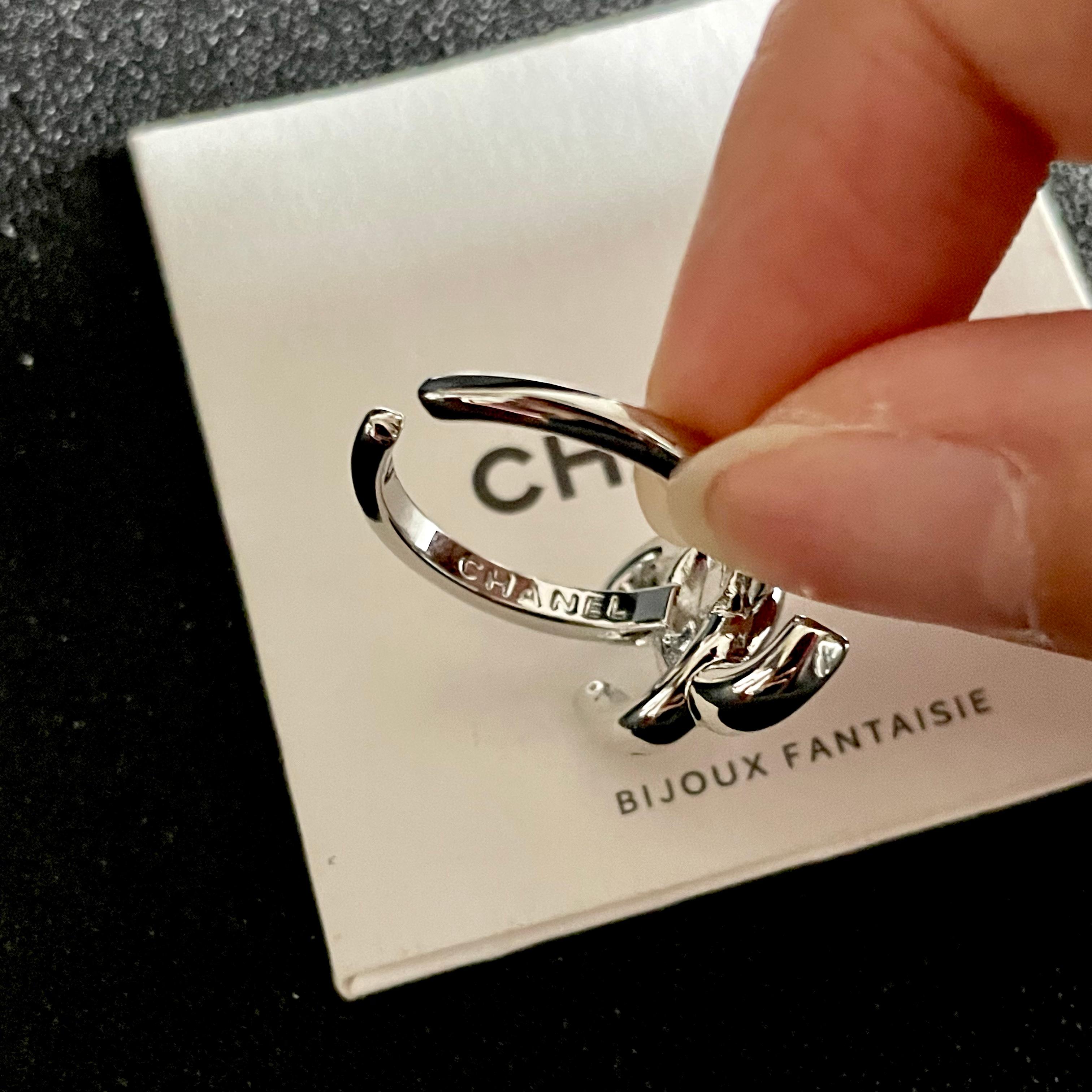 Chanel CC Logo ring silver tone metal no accent stones adjustable open band