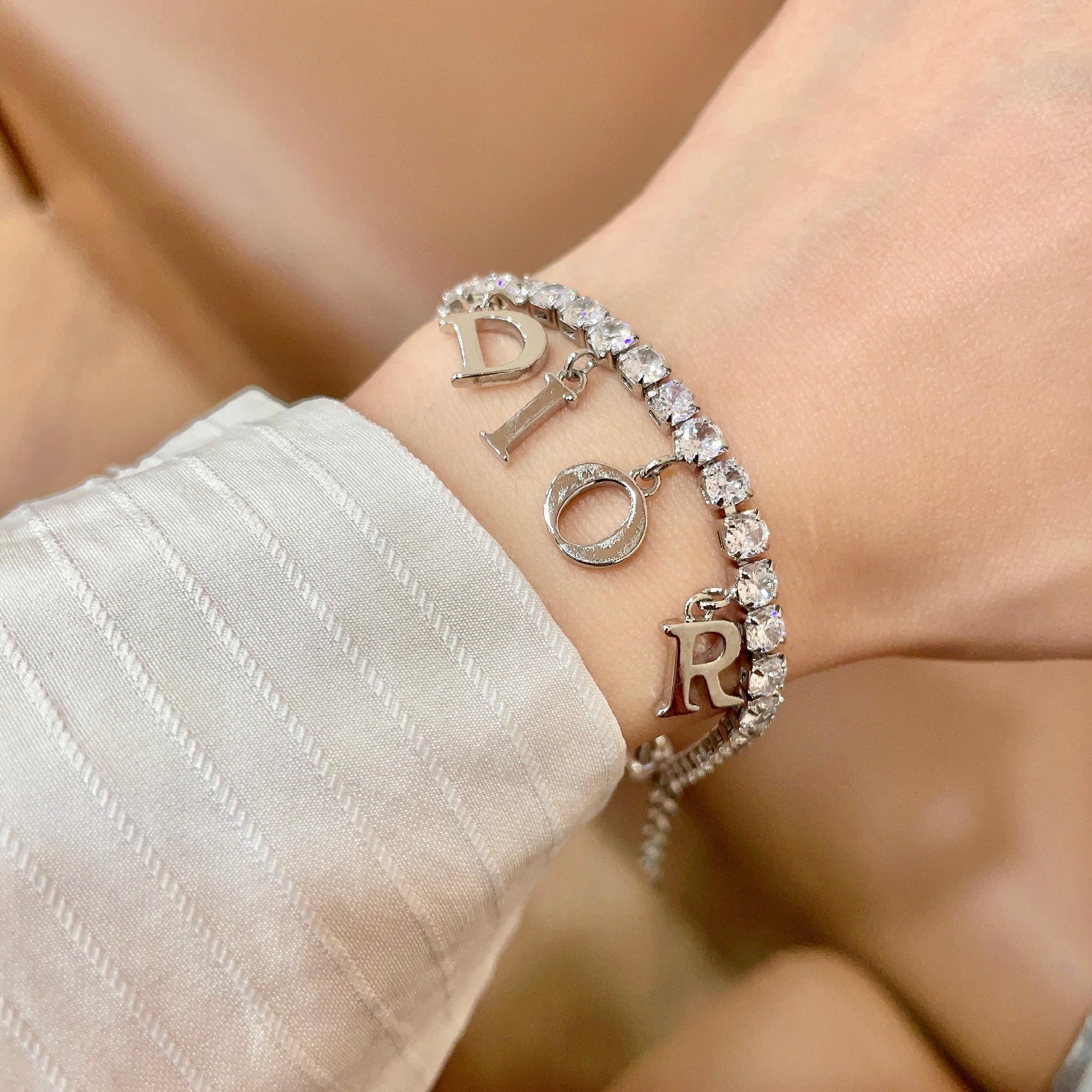 Dior Dio r evolution Crystal Letter Charm bracelet silver-toned metal with clear faceted crystals 16cm with 3cm extender