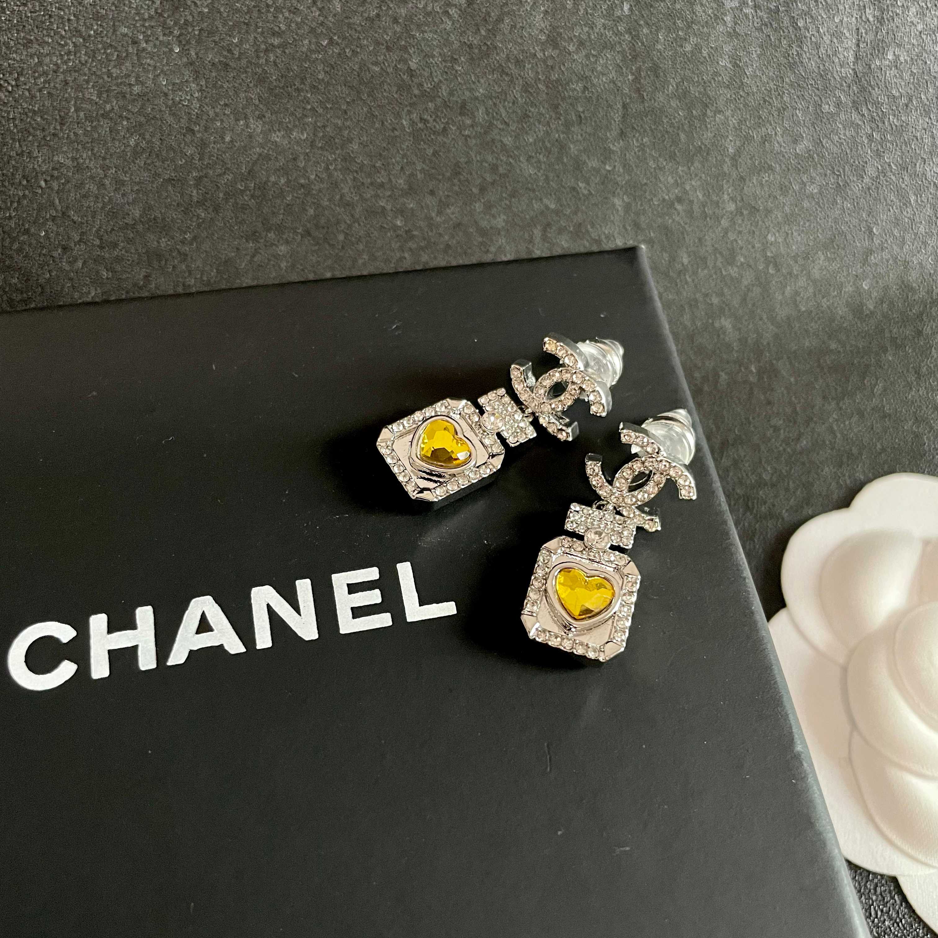 Chanel CC Logo Perfume Bottle Heart Drop Earrings earrings silver-tone metal with clear crystals and yellow heart-shaped gemstone 2 5cm drop length