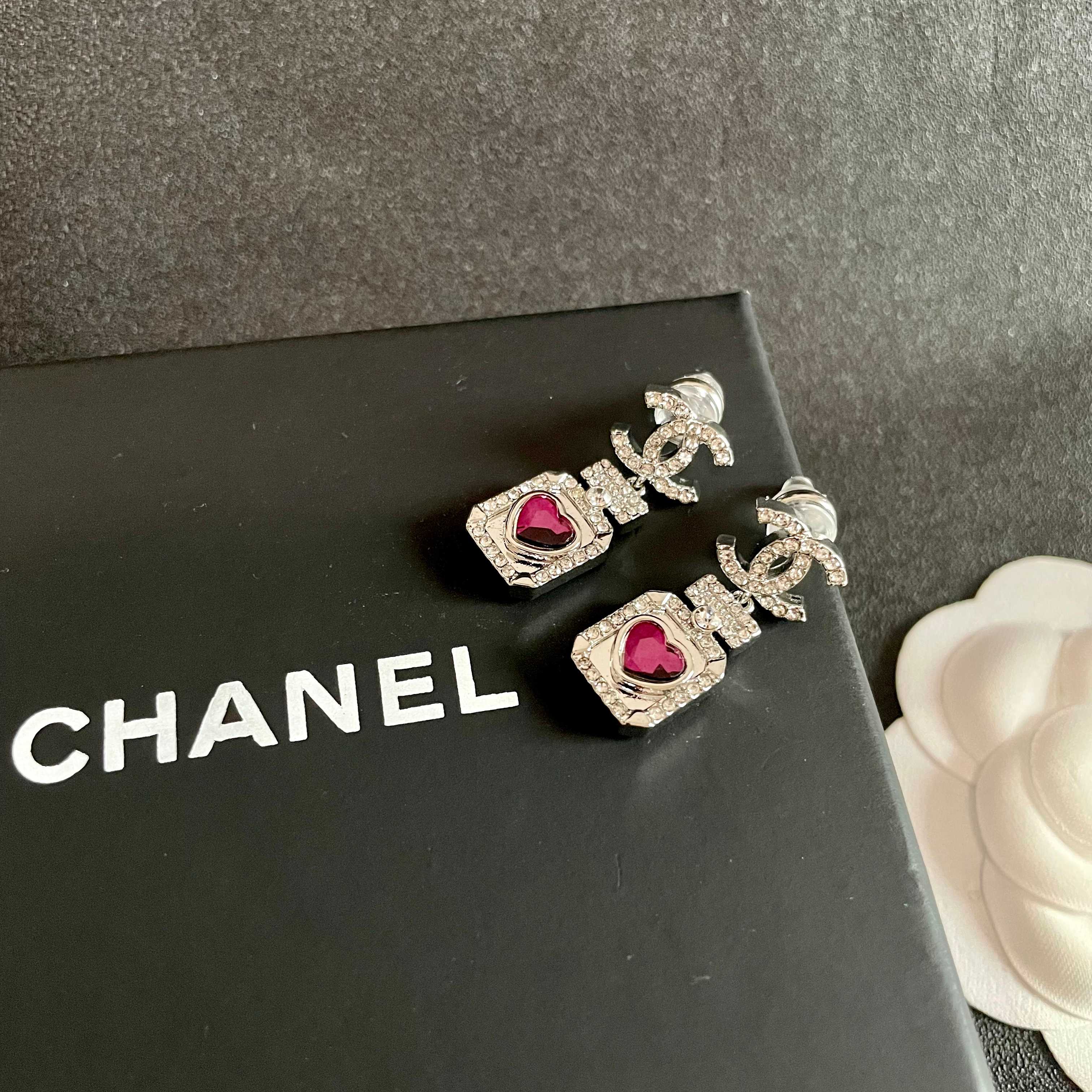 Chanel CC Logo Perfume Bottle Heart Drop Earrings earrings silver-toned metal with clear crystals and fuchsia heart-shaped stone 2 5cm drop length