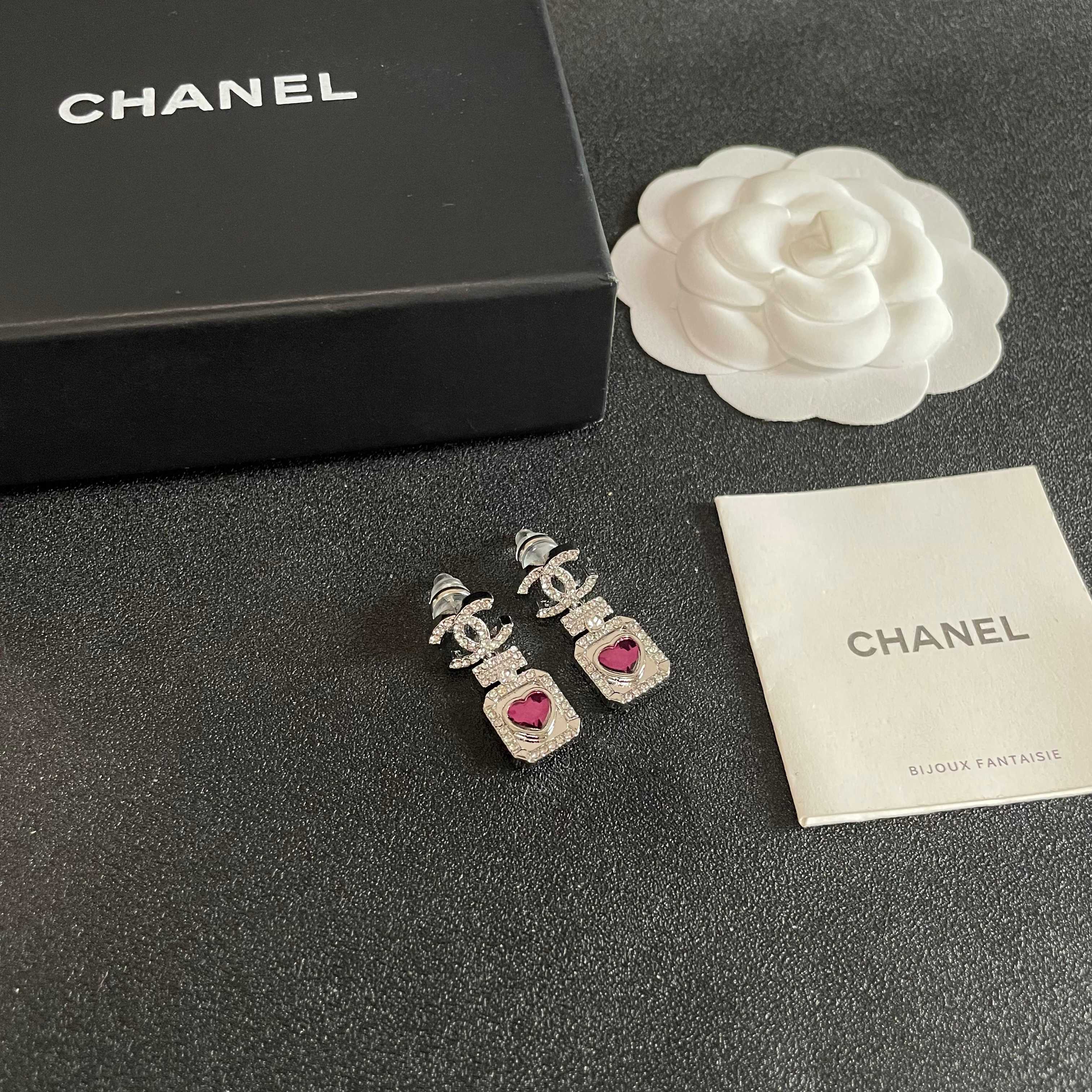 Chanel CC Logo Perfume Bottle Heart Drop Earrings earrings silver-toned metal with clear crystals and fuchsia heart-shaped stone 2 5cm drop length